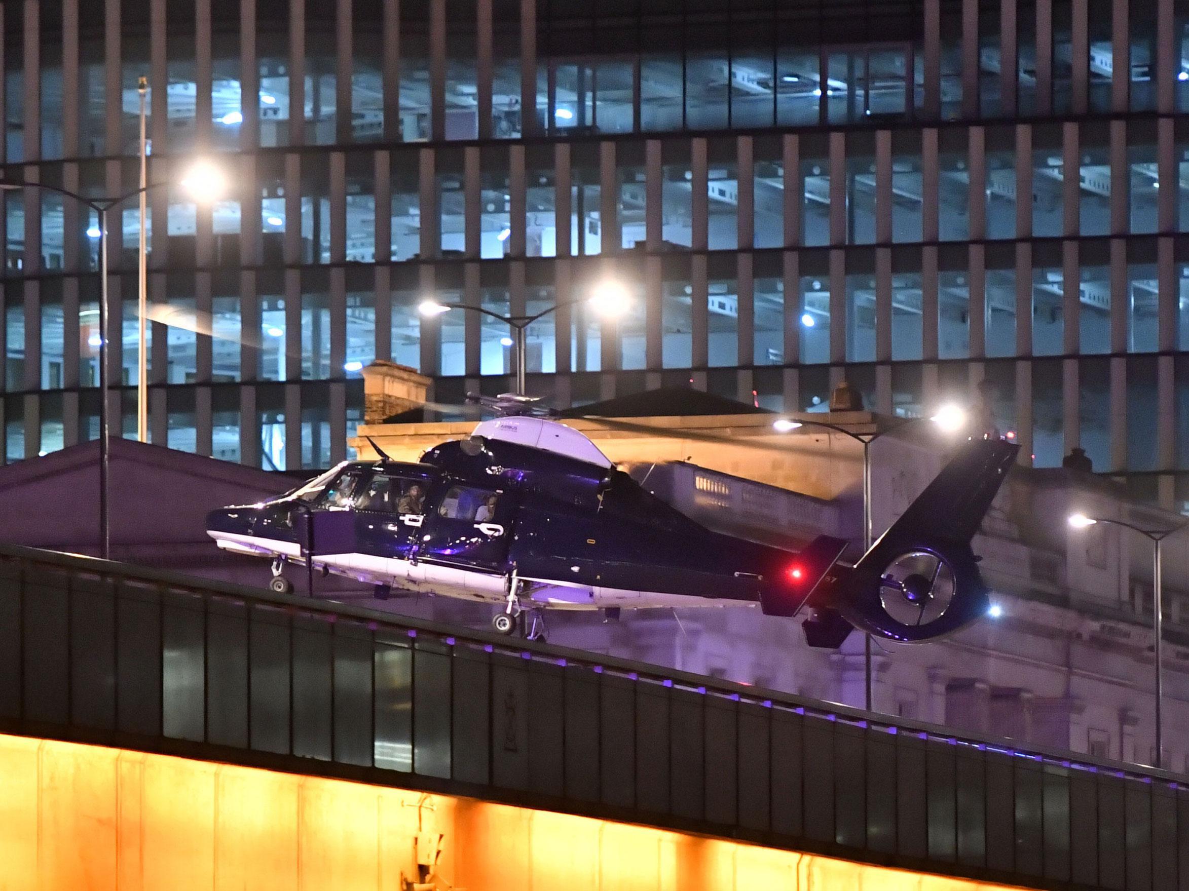 The helicopter believed to be carrying the 'Blue Thunder' SAS squad lands on London Bridge