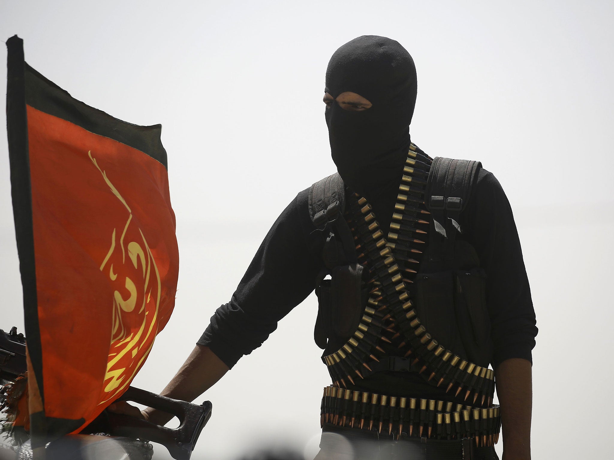 A member of the US-backed Syrian Democratic Forces in the village of Hazima, north of Raqqa, on Tuesday