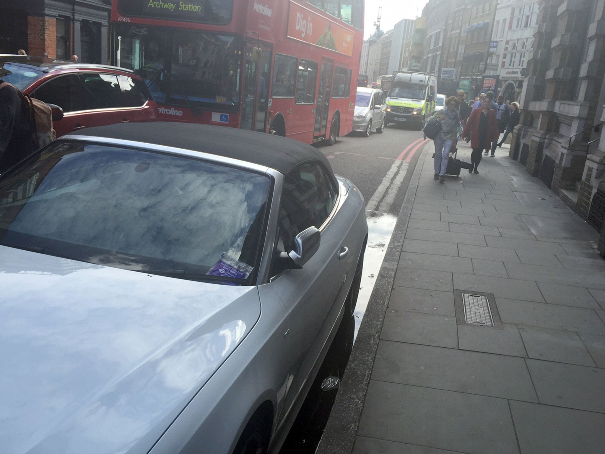 A car with a parking ticket on in Borough High Street as Transport for London has apologised for issuing parking fines to motorists who had to abandon their cars following the terror attack at London Bridge