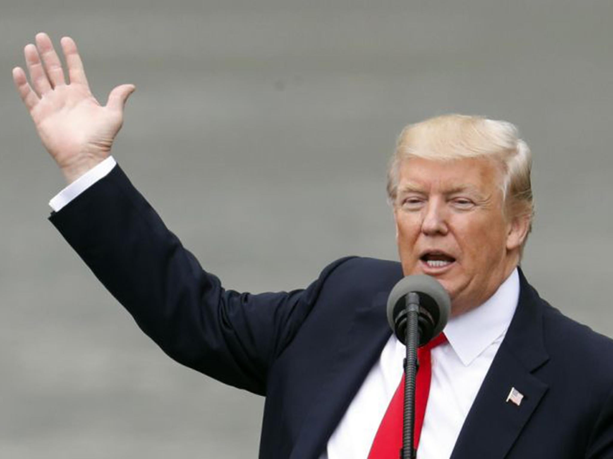 President Donald Trump speaks during a rally at the Rivertowne Marina