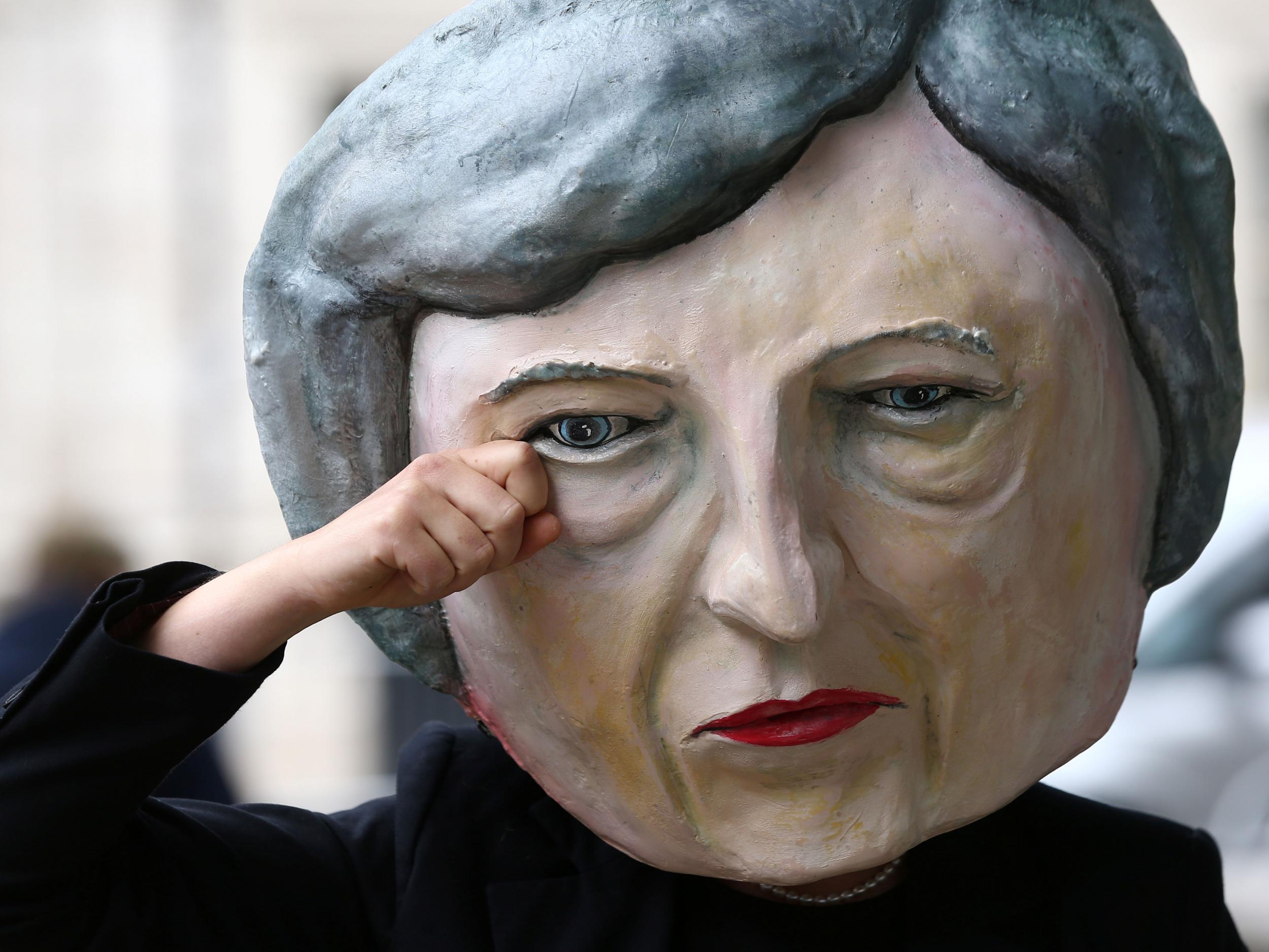 Like this protester outside Downing Street, Theresa May could be shedding a tear over the outcome of the general election and environmentalists may also come to rue to day