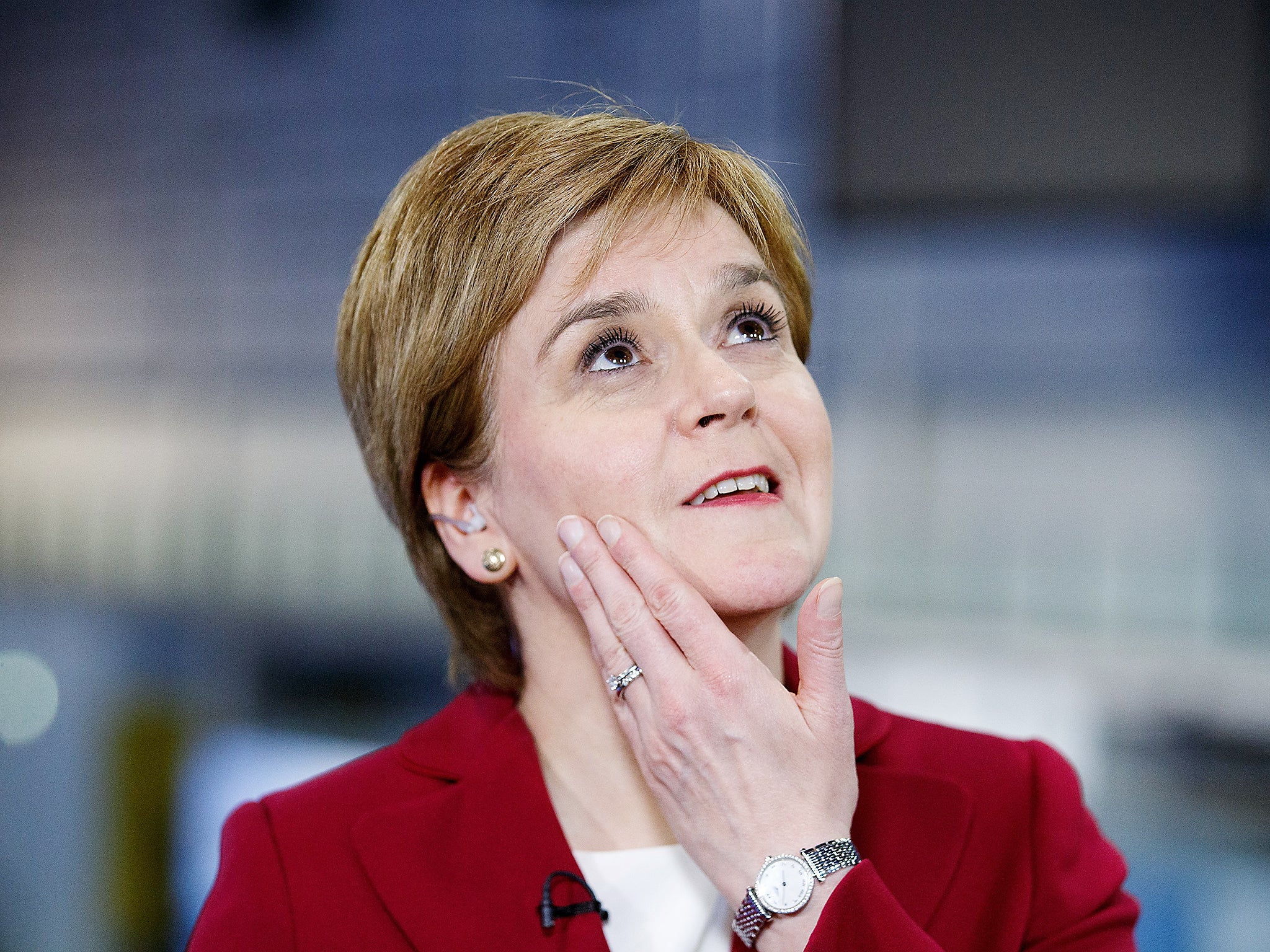 Scottish National Party (SNP) leader Nicola Sturgeon looks up at the Emirates Arena in Glasgow, Scotland