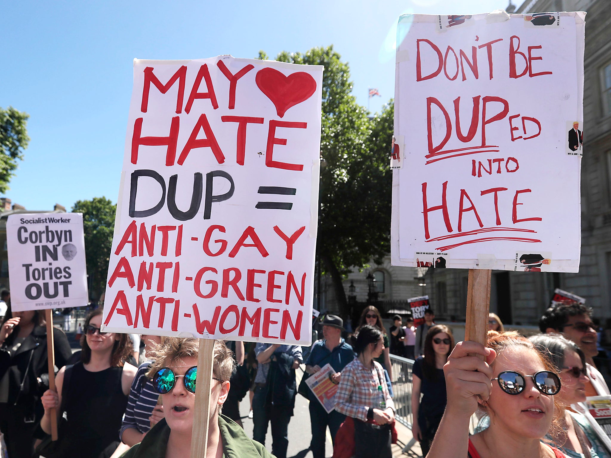 People demonstrate on Whitehall, central London, after the British general election result. Prime Minister Theresa May's party fell short of an overall majority following Thursday's vote, and plans to work with Northern Ireland's Democratic Unionist Party