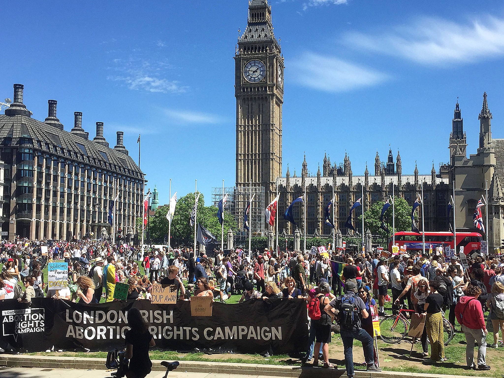 Protesters gather in Westminster, central London to voice their anger at Theresa May's government and her alliance with the Democratic Unionist Party