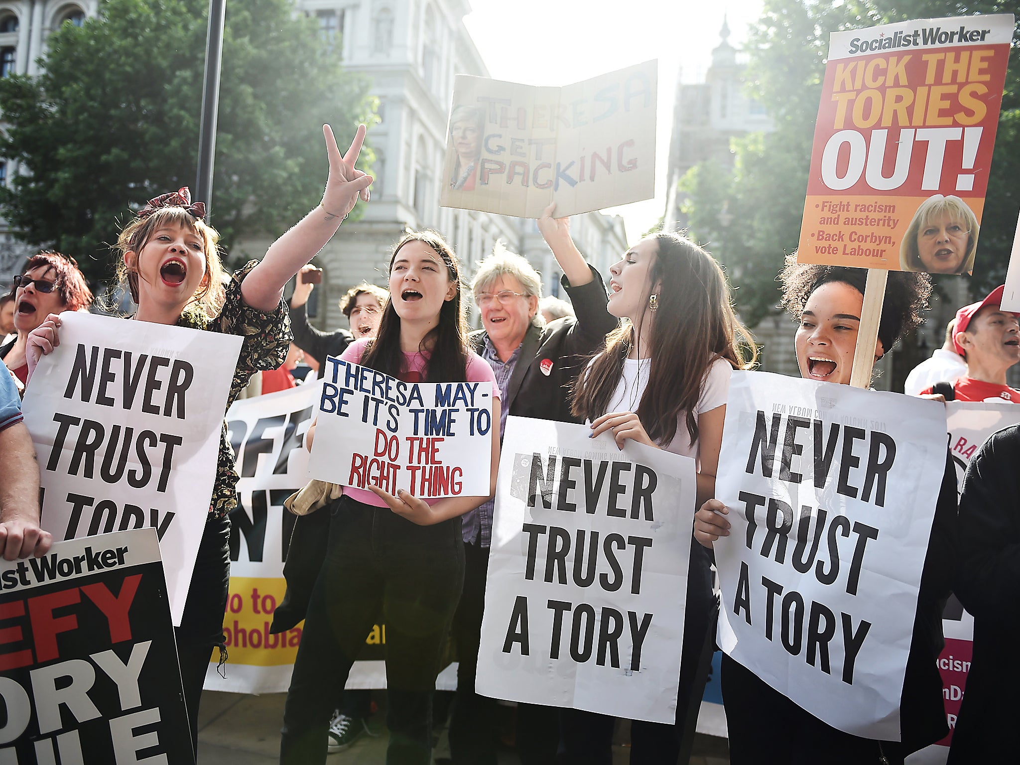 Hundreds marched in London today to protest against the formation of a coalition between the two parties