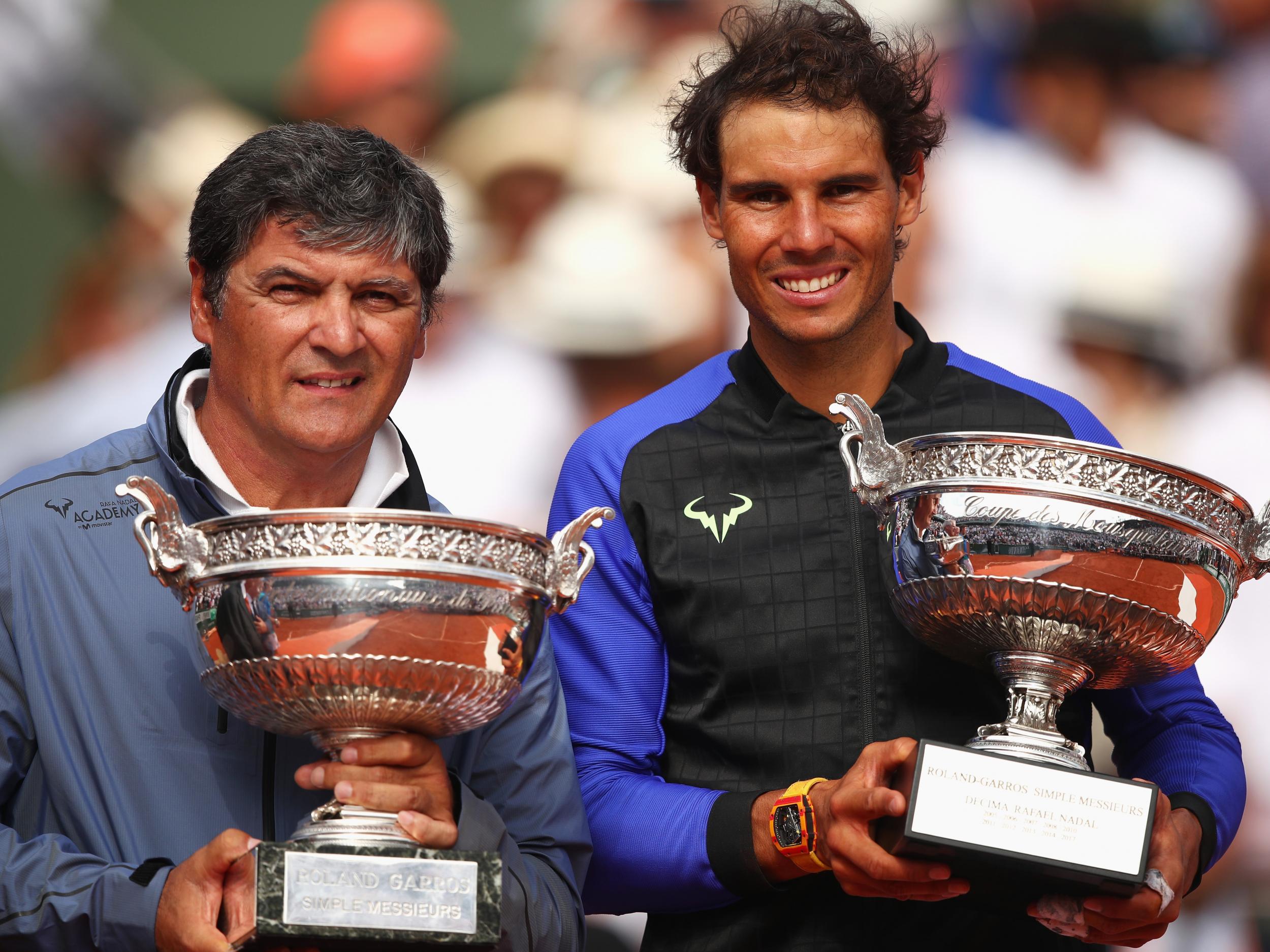 Nadal poses with his uncle Toni