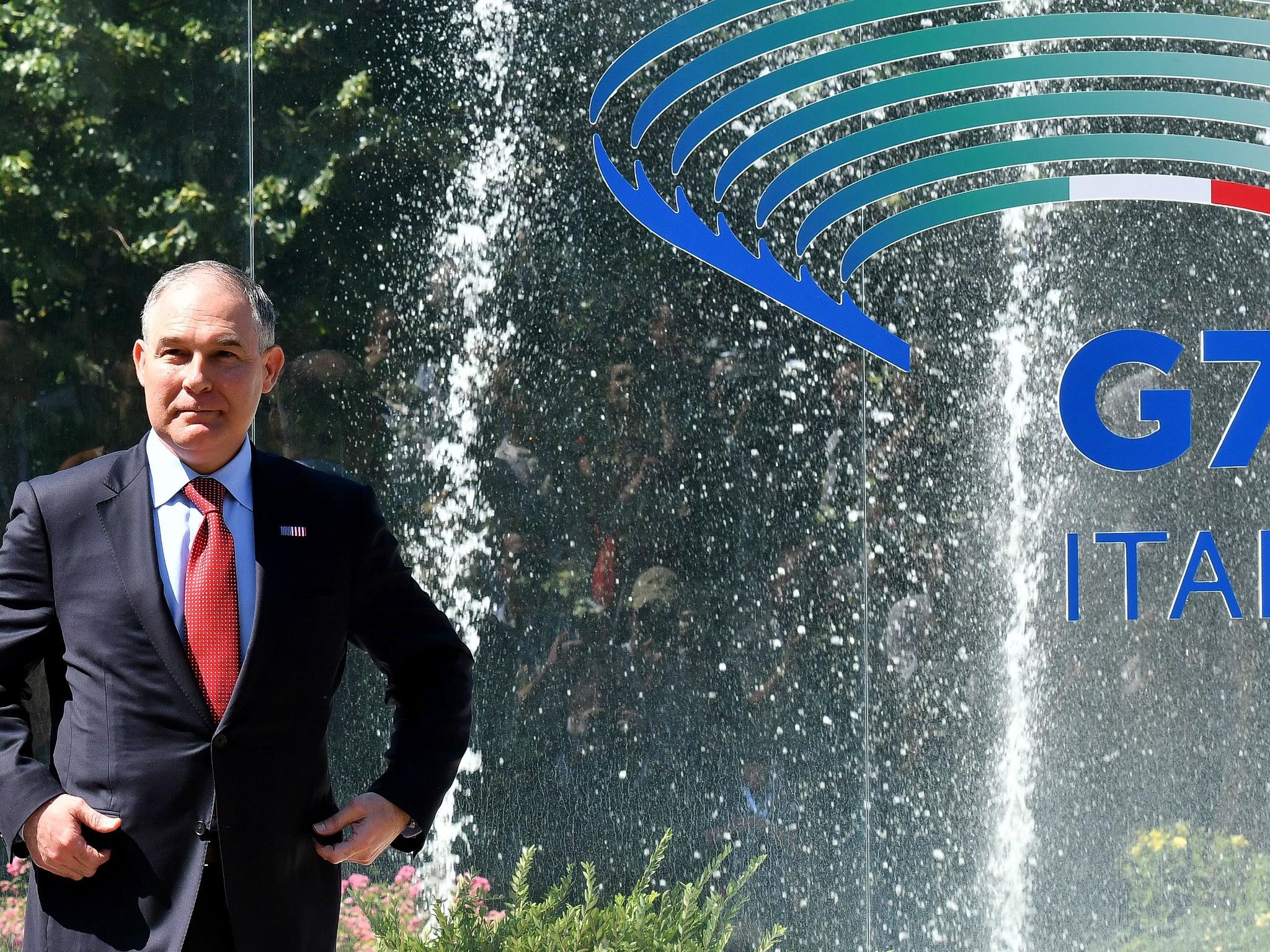 Head of the Environmental Protection Agency (EPA) Scott Pruitt prepares to pose for a group photo during the G7 Environment summit on 11 June 2017 in Bologna.