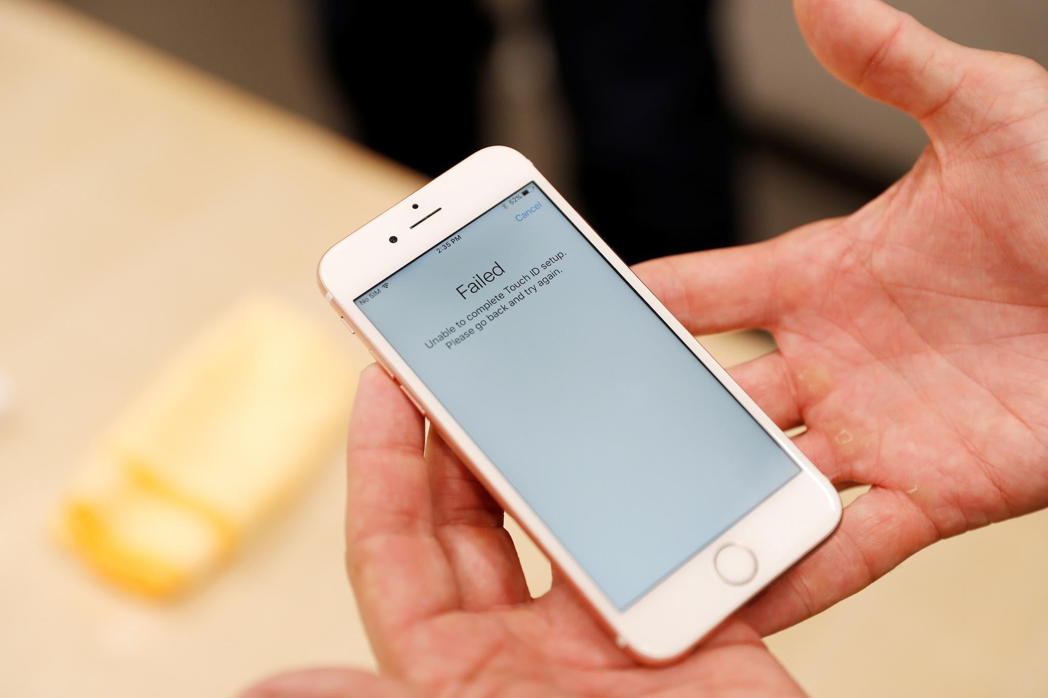 A broken Apple iPhone repaired by a third party service provider is seen at Apple's display repair laboratory in Sunnyvale, California