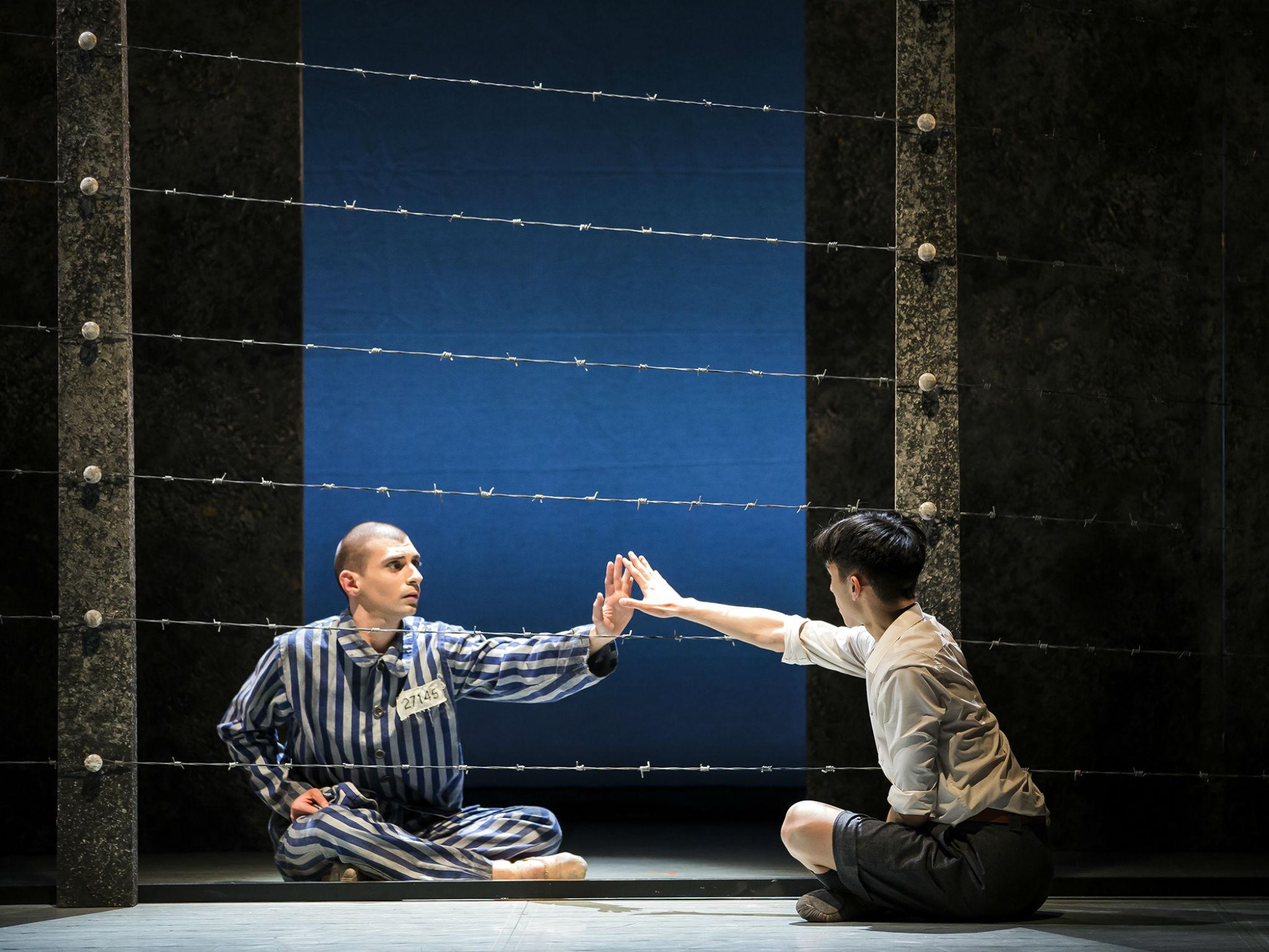 Matthew Koon as Bruno and Filippo Di Vilio as Shmuel in 'The Boy in the Striped Pyjamas' at Richmond Theatre