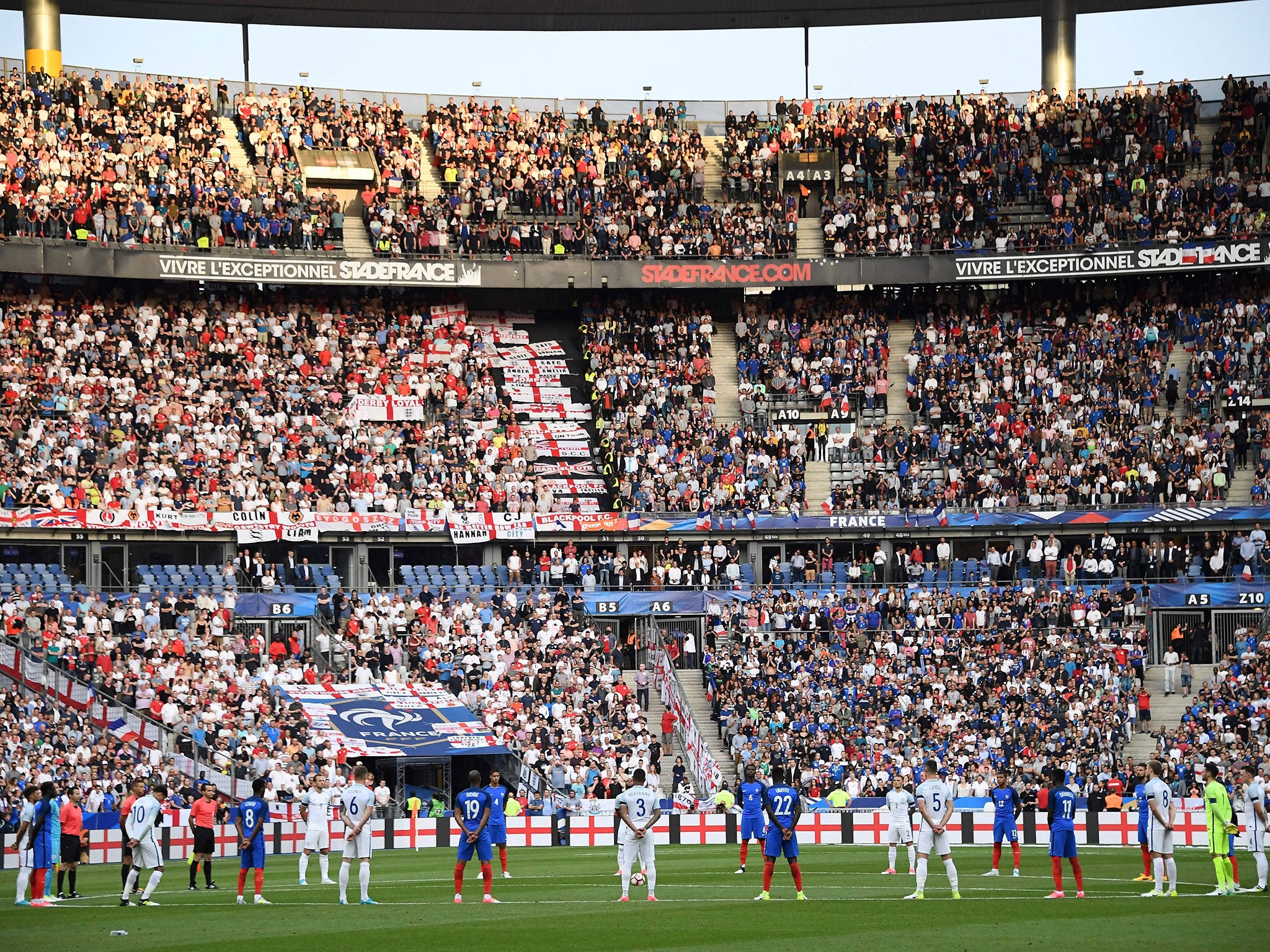 The Stade de France observes a minute's silence before kick-off