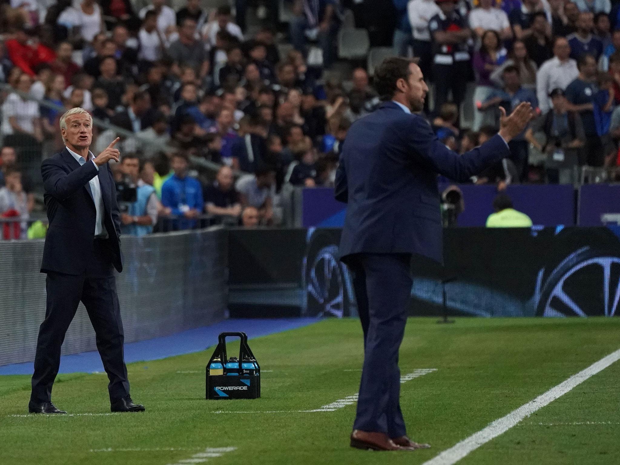Didier Deschamps and Gareth Southgate both issue instructions from the sideline