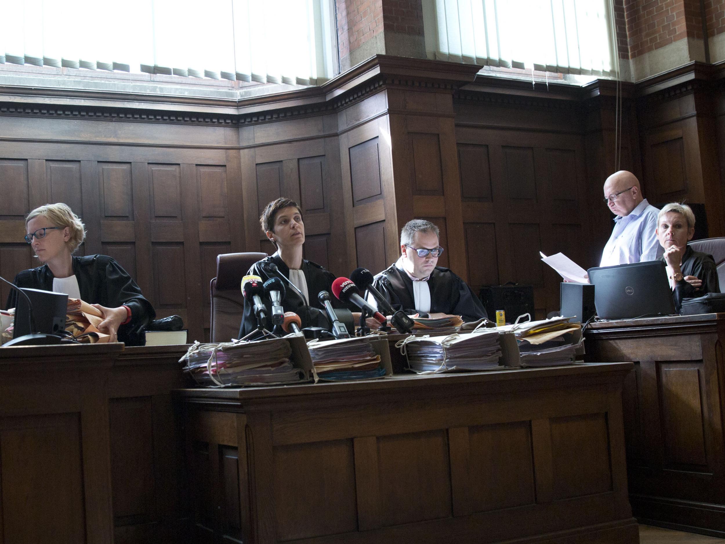 Judge Mieke Butstraen, centre, reads out the ruling on the case of baby Lucas at the Court of First Instance in Dendermonde, Belgium