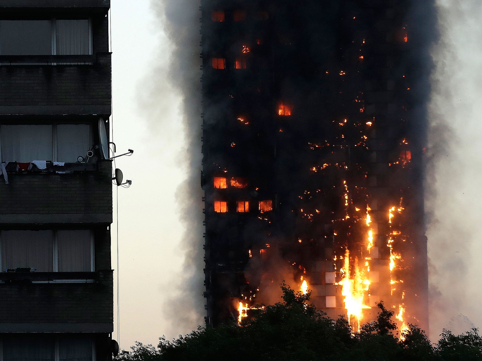 Smoke and flames rise from Grenfell Tower