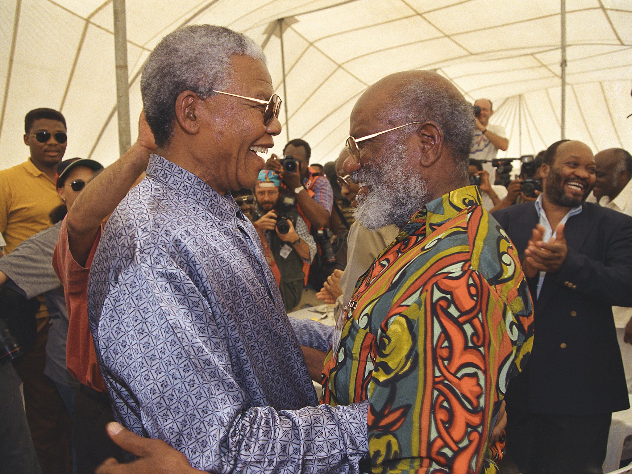 Nelson Mandela greets Ya Toivo at the Robben Island reunion in 2005