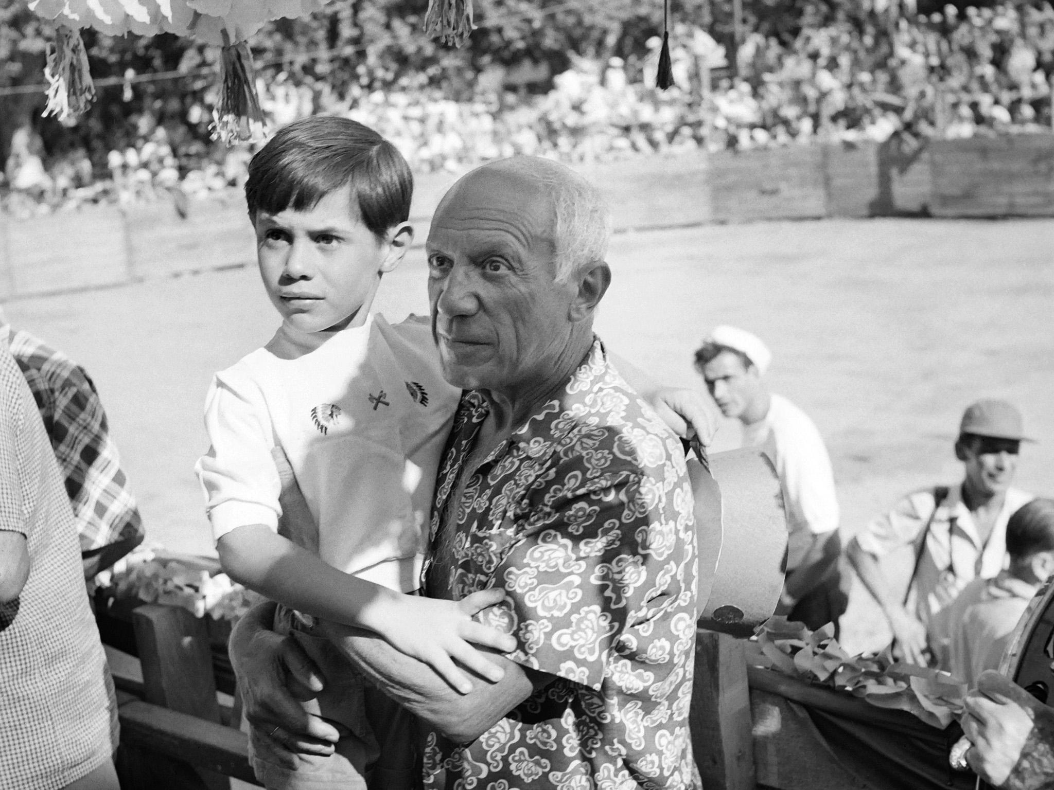 August 1954, Vallauris: Pablo Picasso was 68 when he fathered his son Claude, seen here during a bullfight