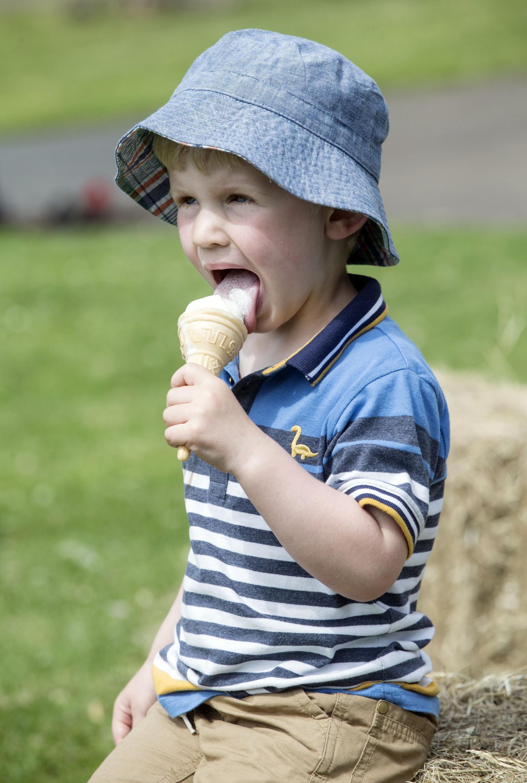 Benjamin Scott enjoys an ice cream at in Heckmondwike, West Yorskshire