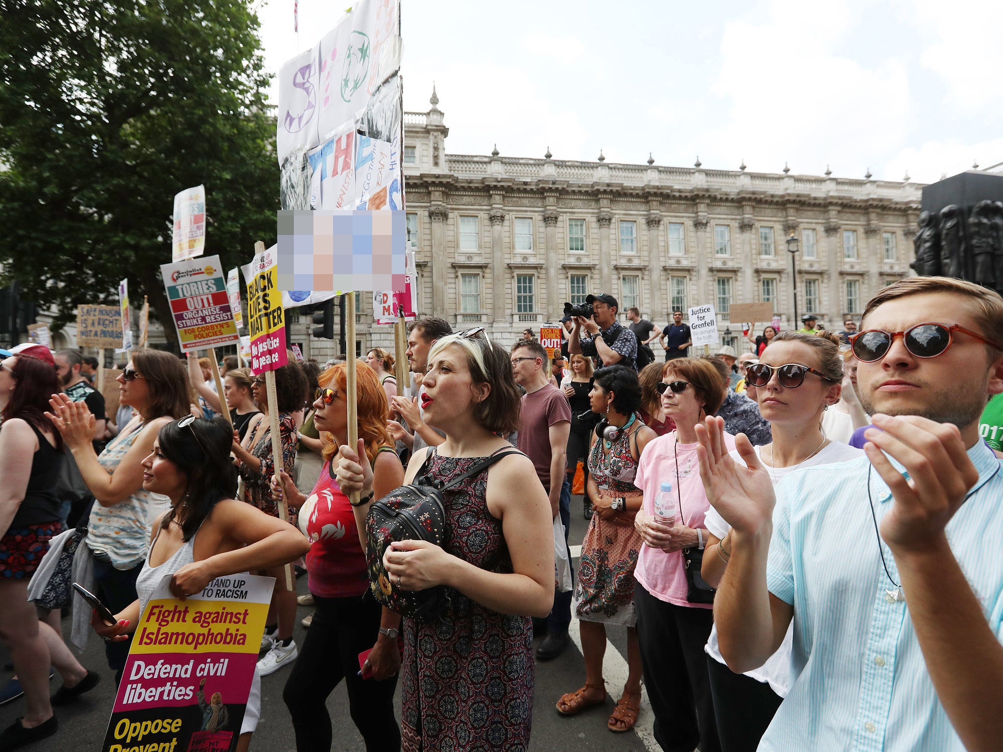 Protesters in Whitehall, London, demanding answers and justice over the Grenfell Tower disaster