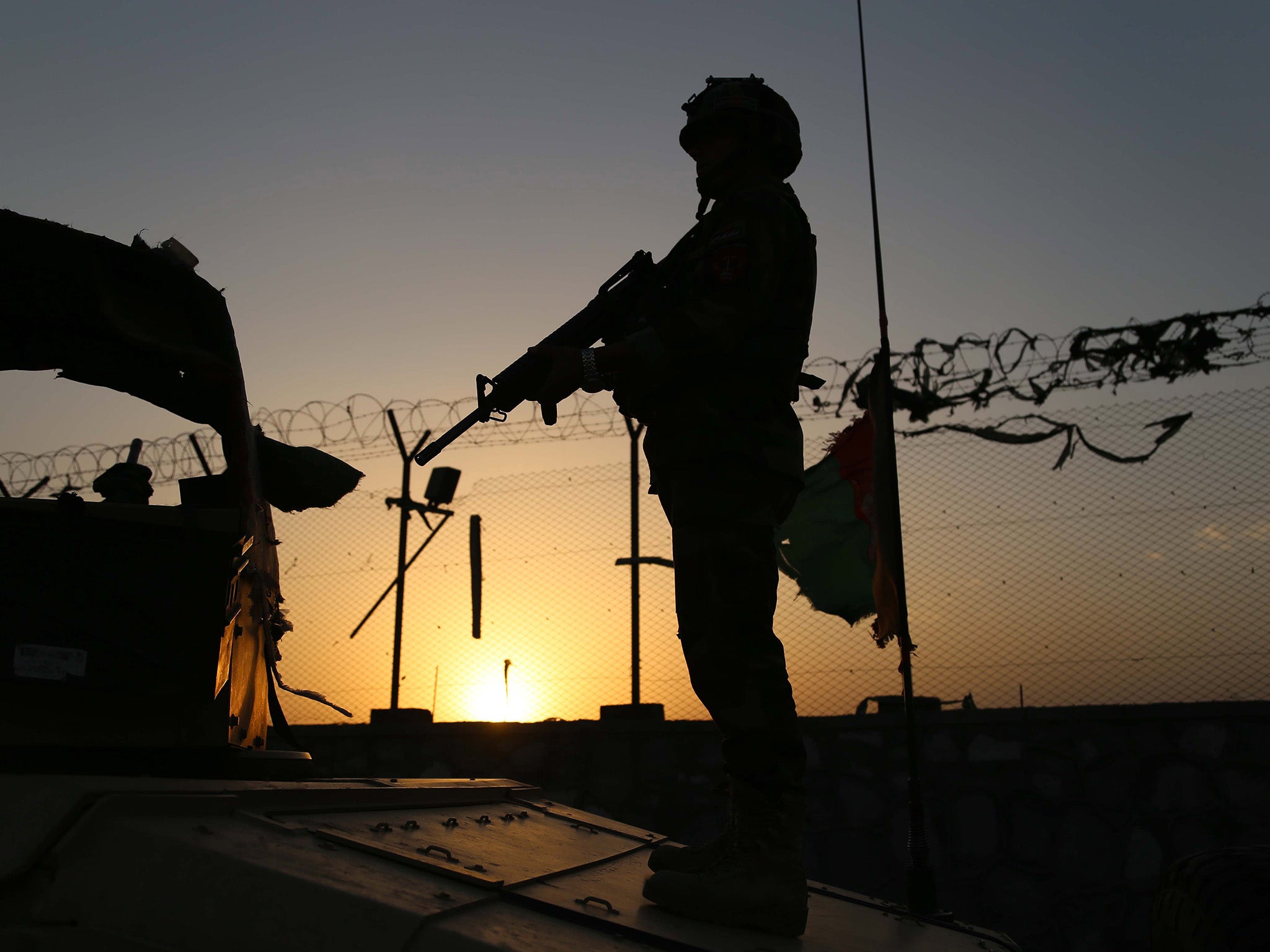 An Afghan Army soldier mans a check point in Jalalabad, Afghanistan, 10 June 2017