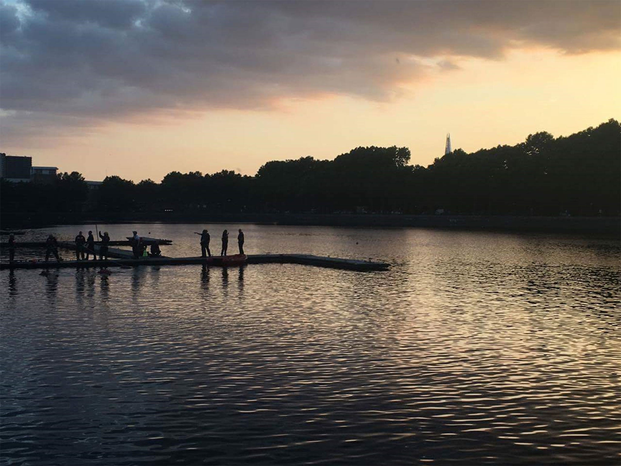 Emergency services searching for a missing 26-year-old man in Greenland Dock, London, on 17 June