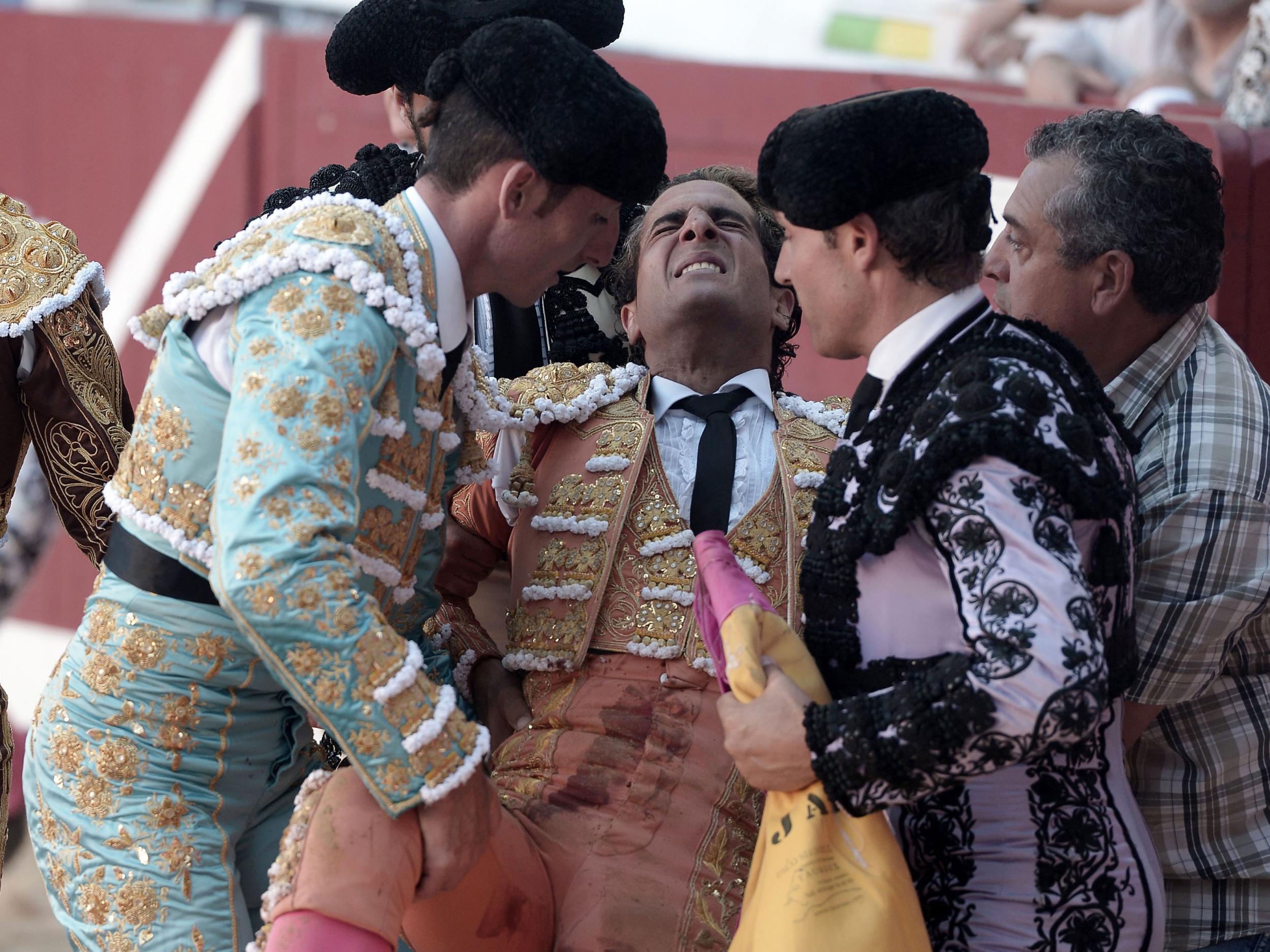 Mr Fandiño is assisted after the fight. He later died of his injuries