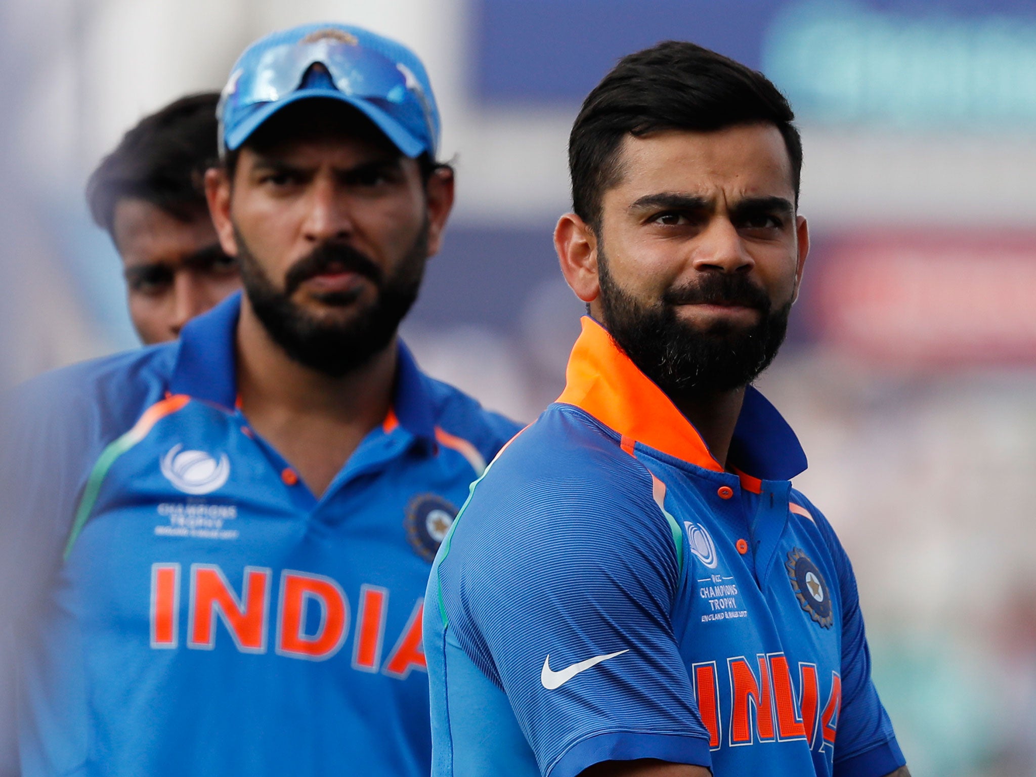 India's captain Virat Kohli looks on after his side succumbed to defeat