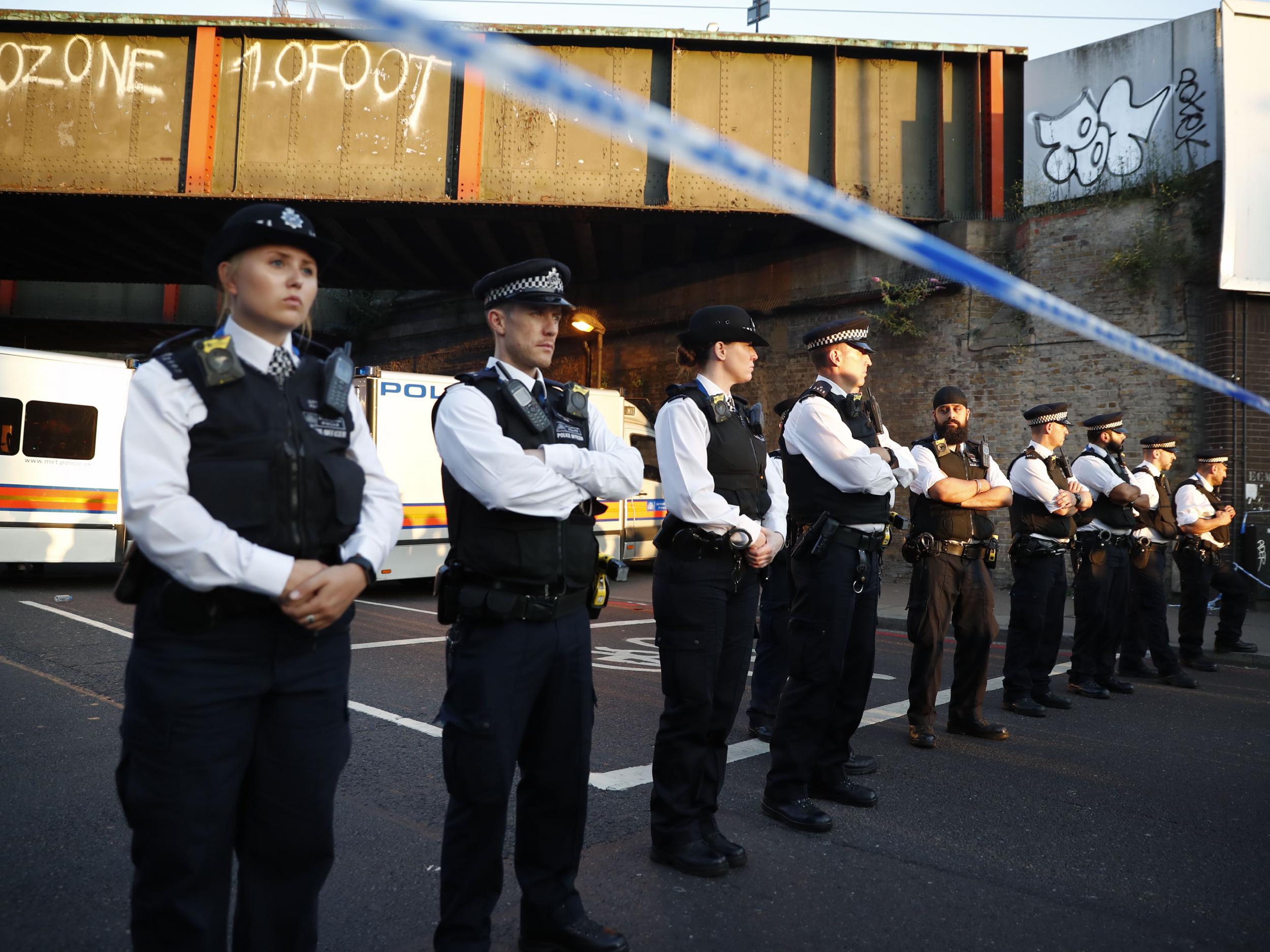 Police man a cordon at the scene in the Finsbury Park area of north London