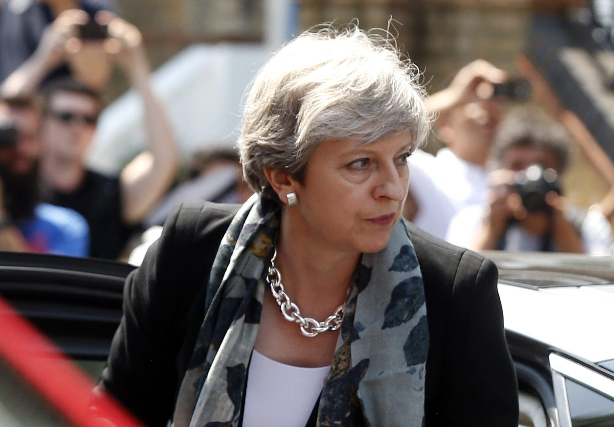 Theresa May arrives near the scene where a van struck pedestrians outside a mosque in Finsbury Park