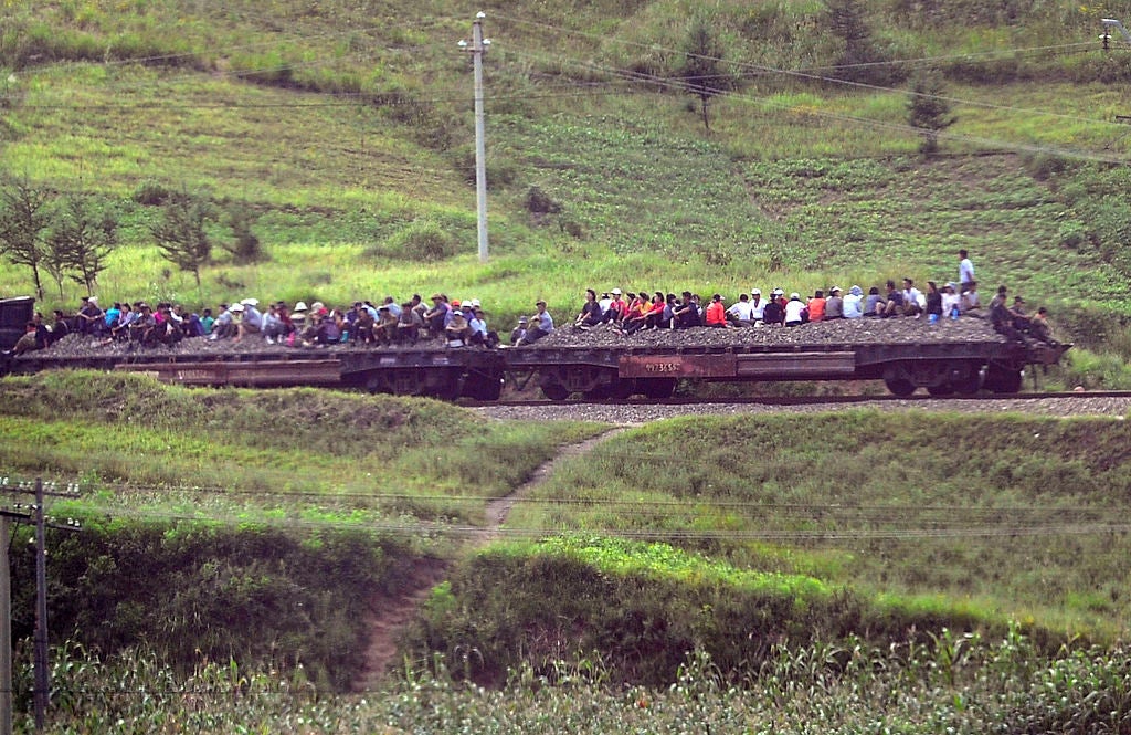 The real North Korea (glimpsed here from a train carriage) is nothing like what you’ll see on a tour, says this writer (AFP/Getty)