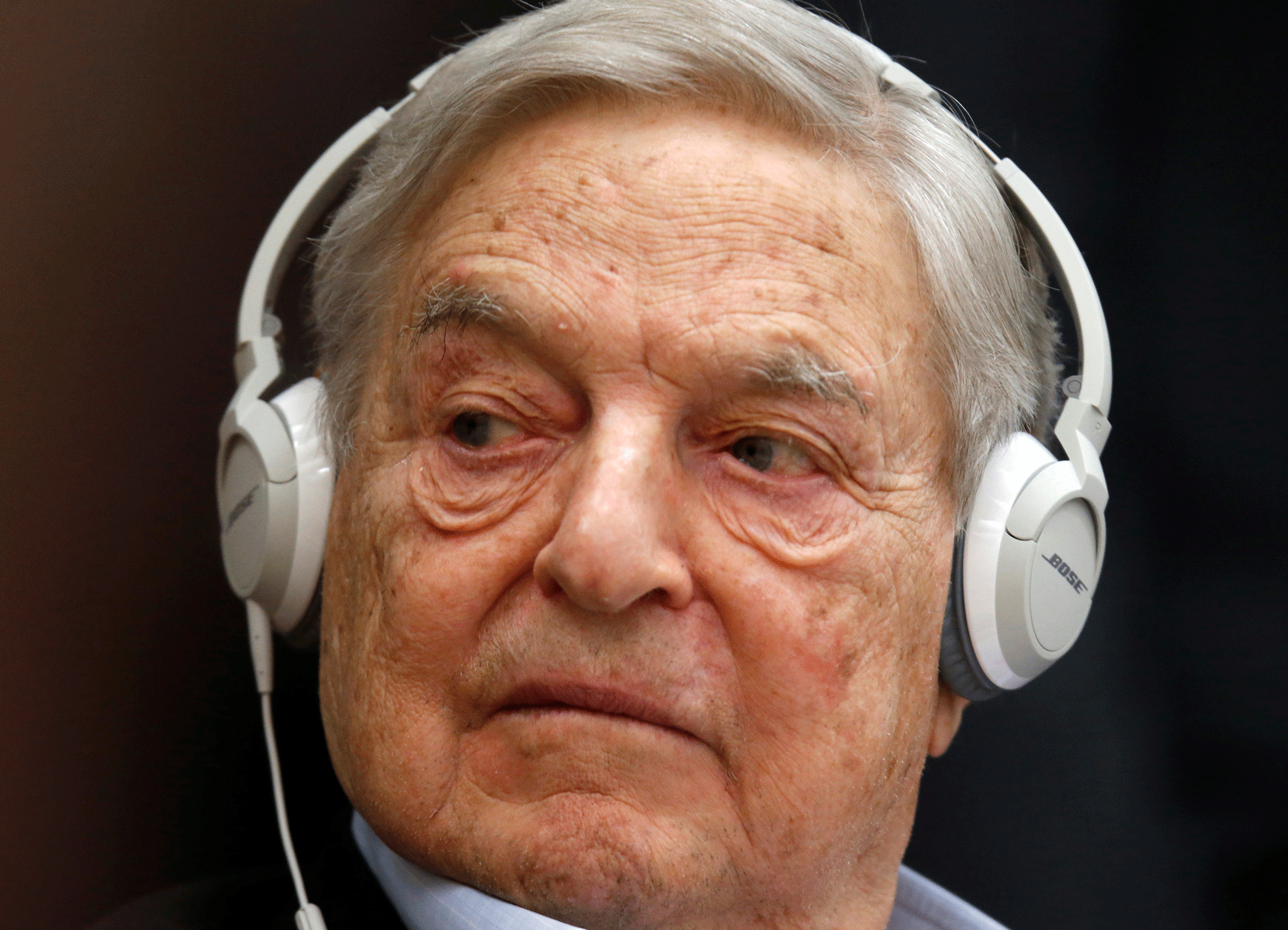 Theresa May should seek to keep Britain in the EU's single market, Mr Soros said