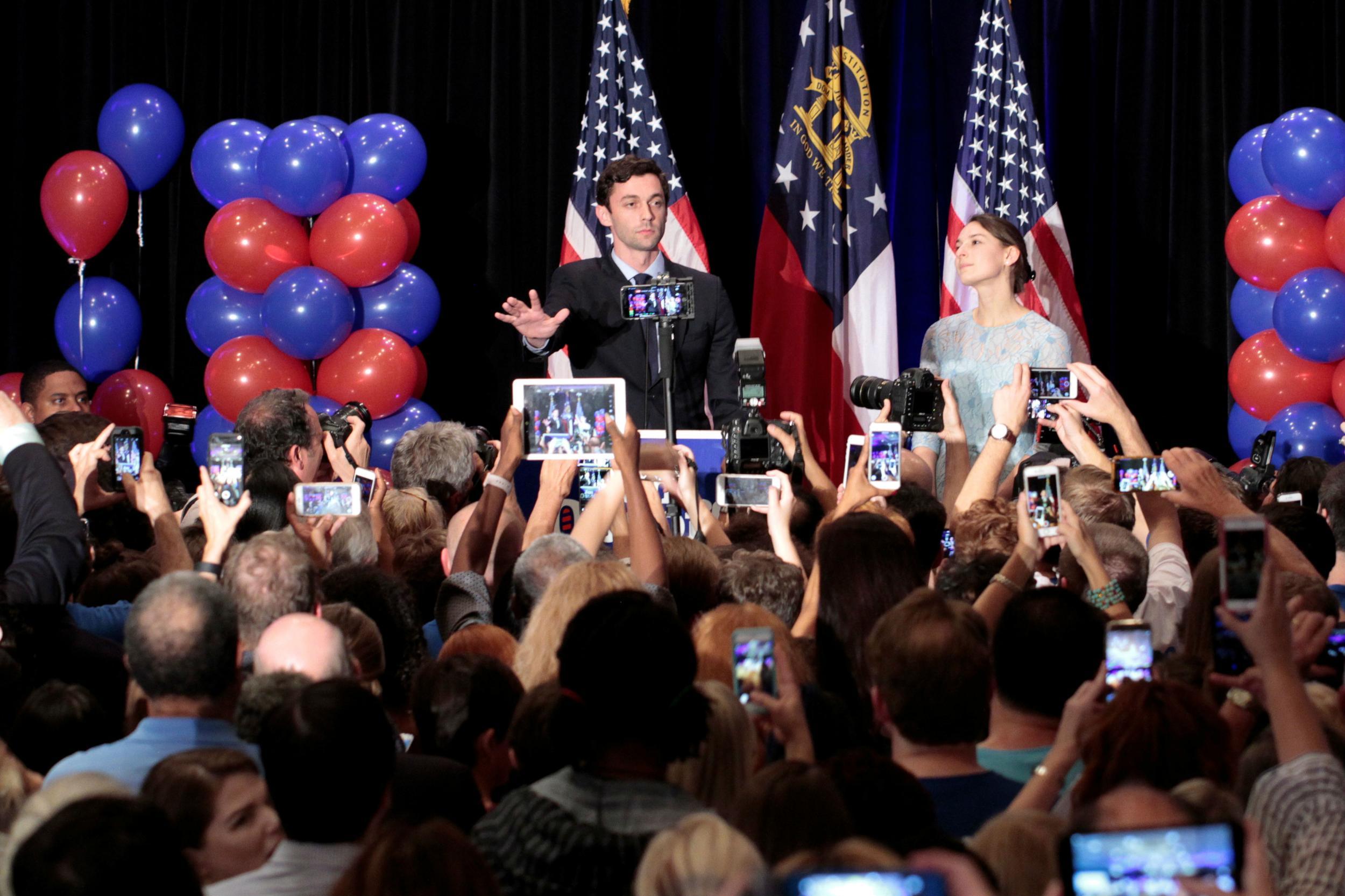 Mr Ossoff was joined by his finance, Alisha Kramer