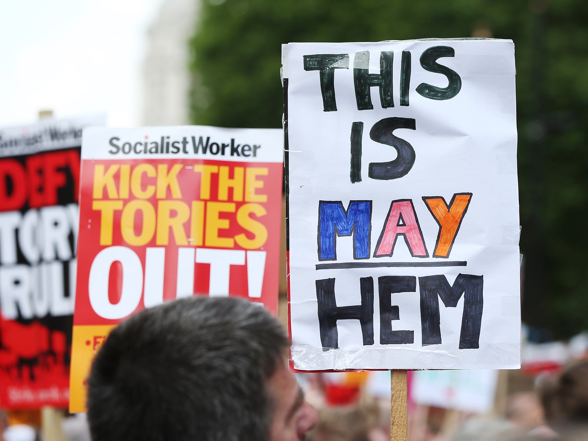 Protesters in Whitehall, London, demanding answers and justice over the Grenfell Tower disaster on Saturday, 17 June