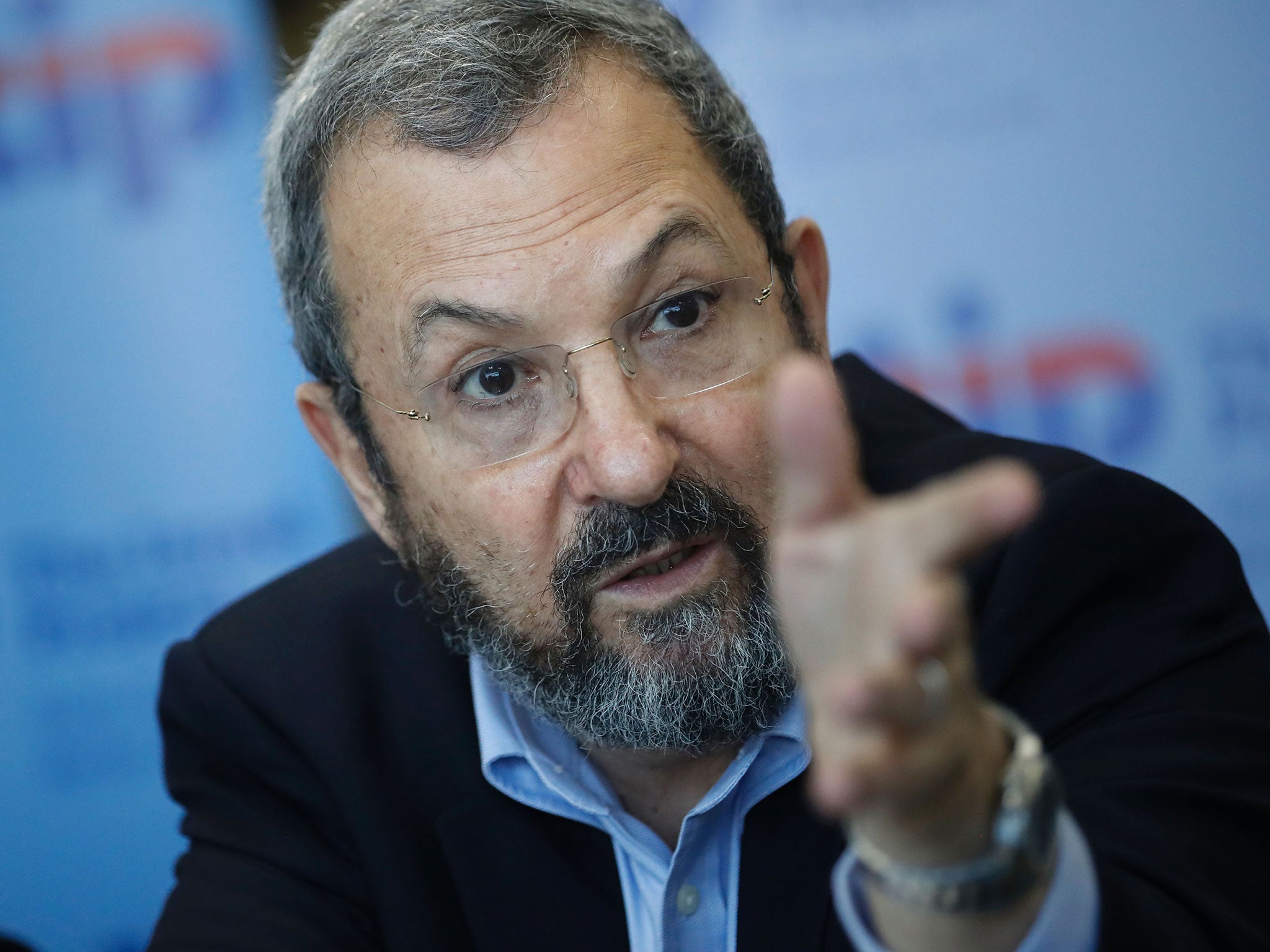 Former Israeli prime minister Ehud Barak gestures as he talks with foreign journalists in Jerusalem, on April 4, 2016.