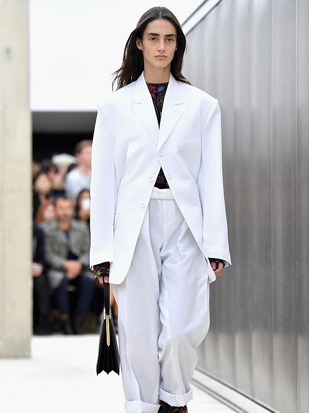 Celine ditched the colour’s saintly associations with their white power suits (Getty)