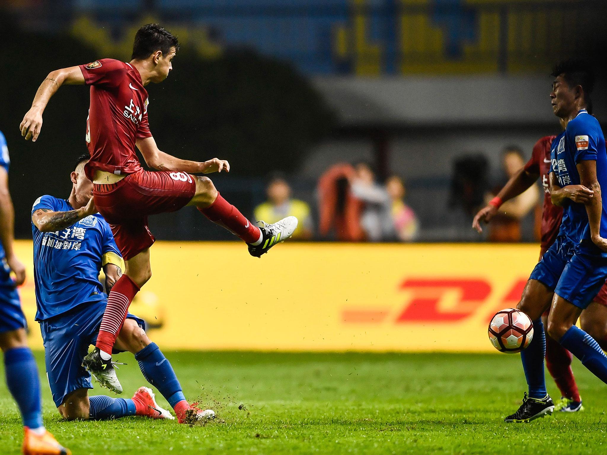 Oscar kicked the ball at two opponents during Sunday's match