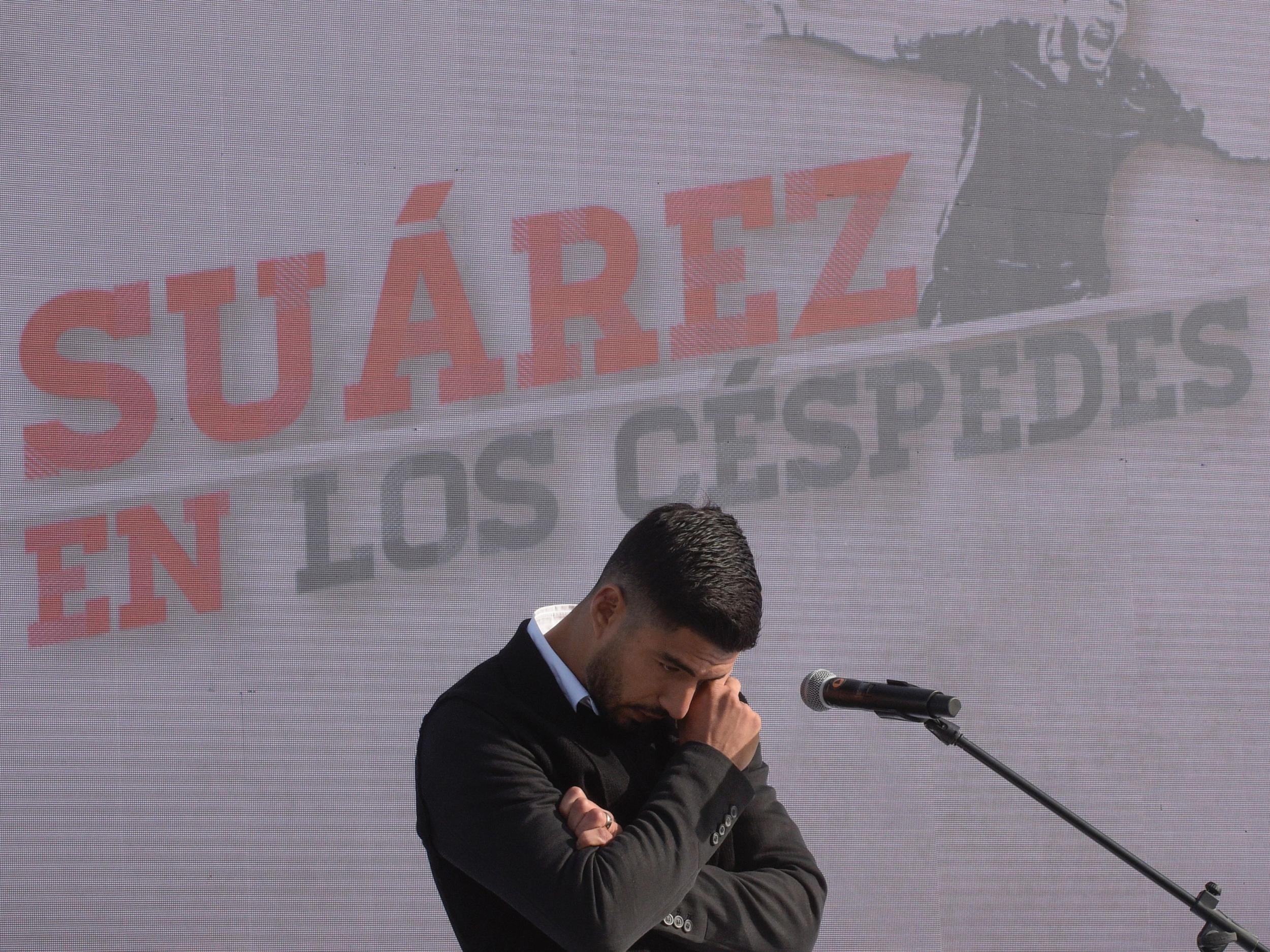 Suarez had a tear in his eye as the pitch was unveiled in front of a large crowd