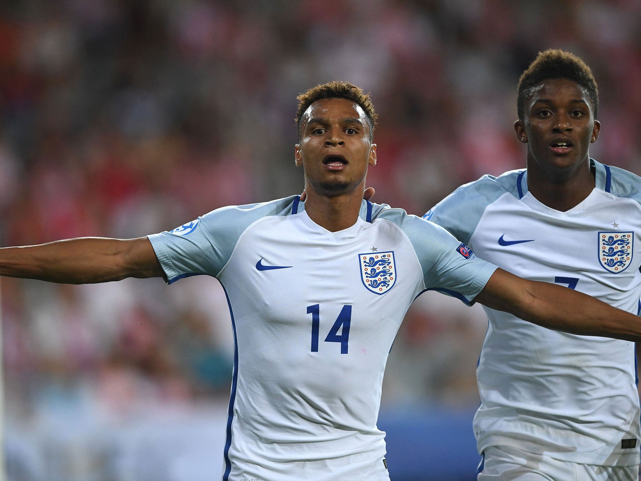 Jacob Murphy celebrates scoring with teammate midfielder Demarai Gray