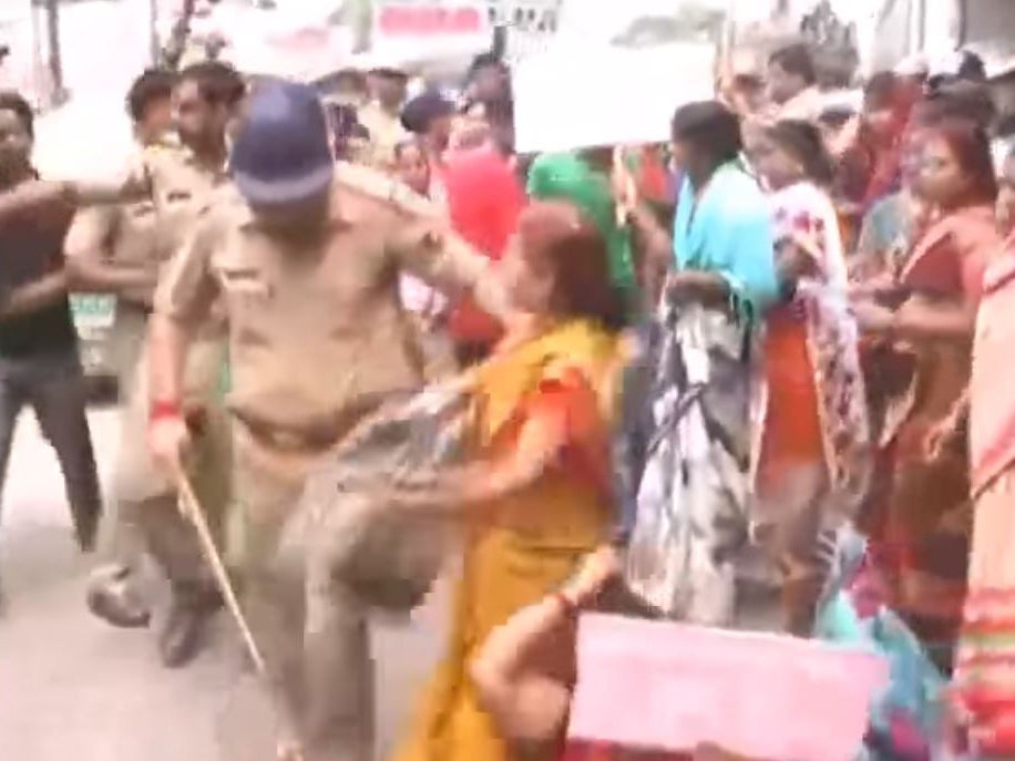 Police clash with protesters after the alleged rape of a 17-year-old girl in Kanpur, India