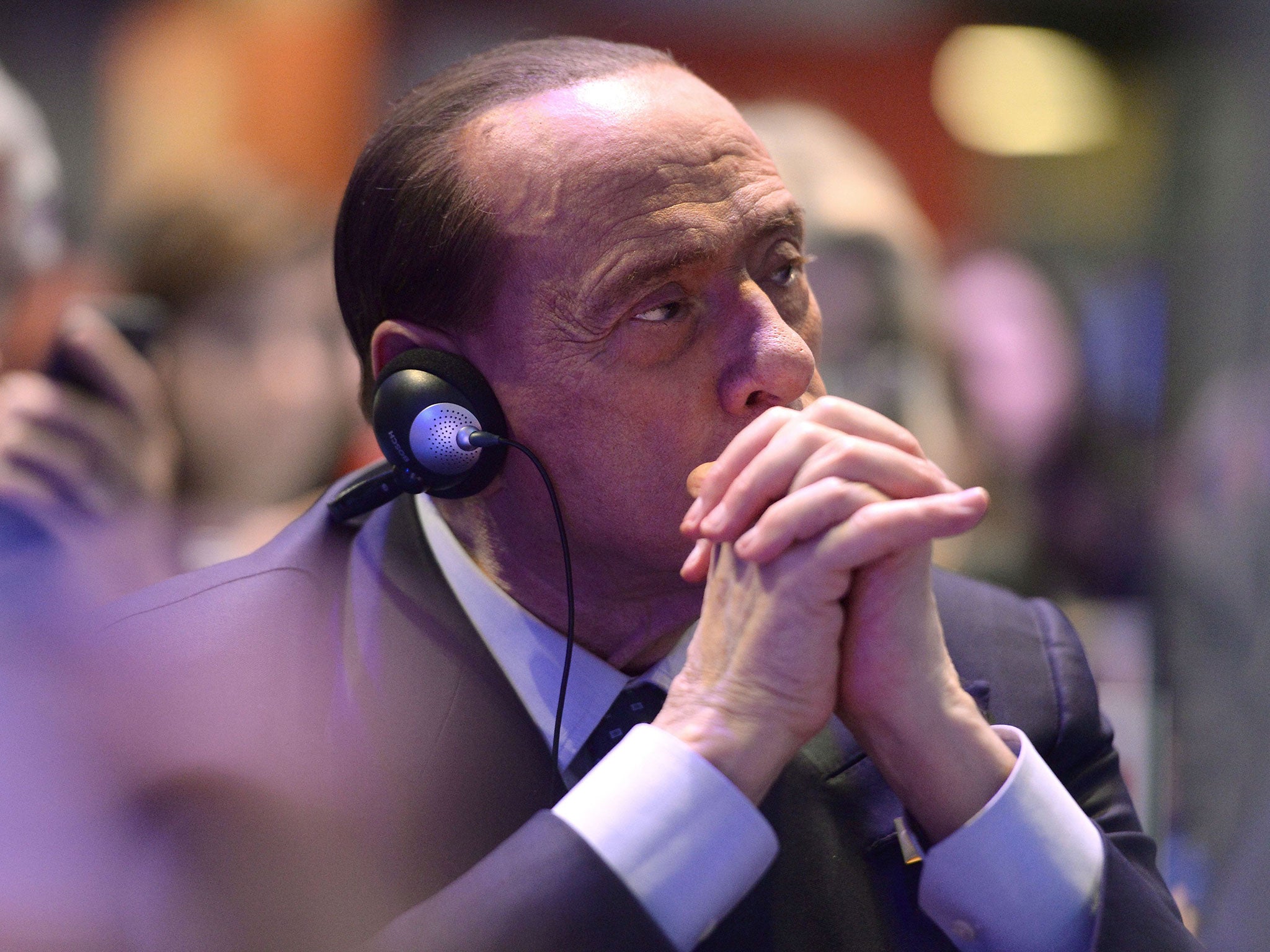 Silvio Berlusconi decided to give up a 100 per cent stake in AC Milan after suffering a heart attack