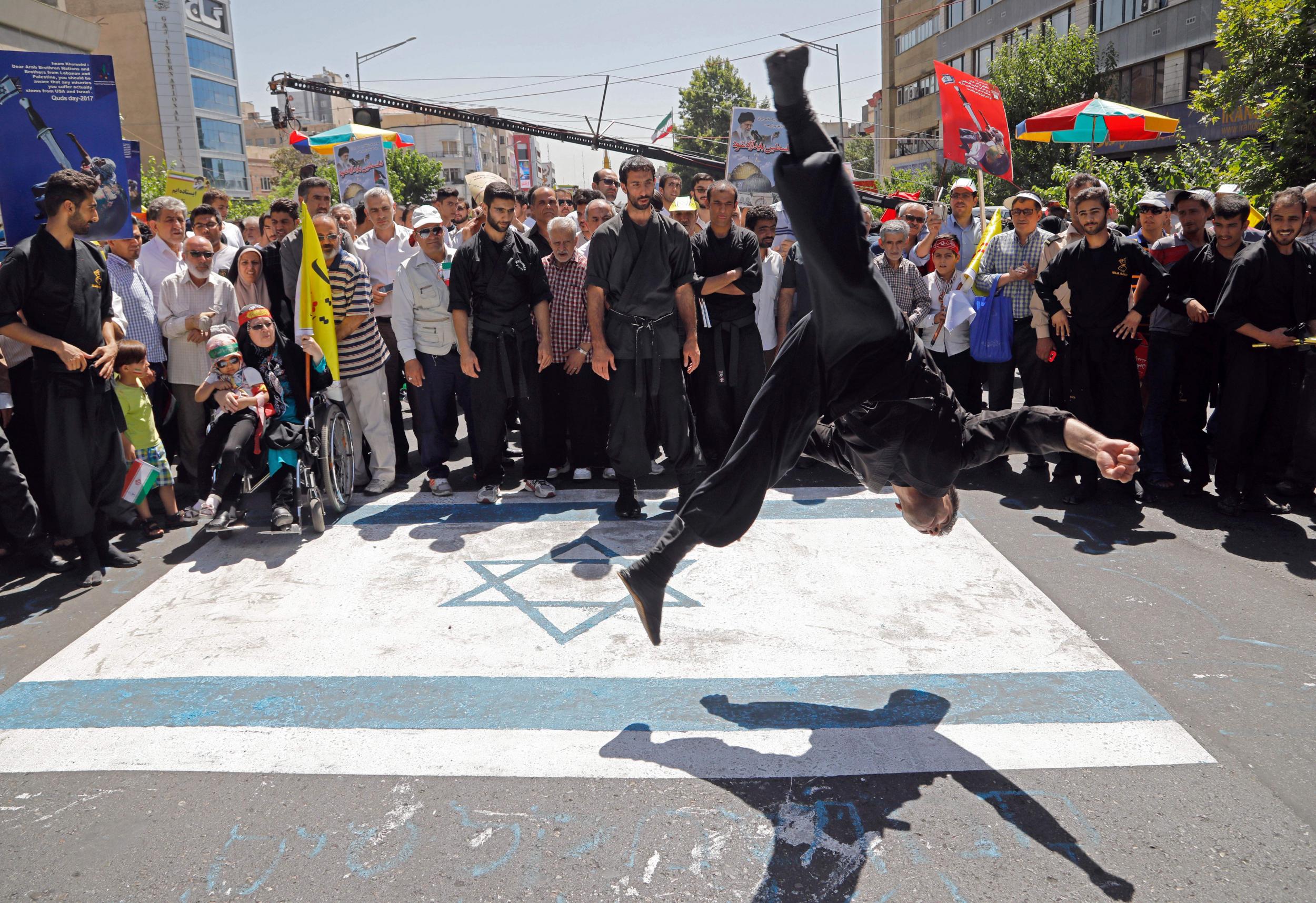 Iranians attend a rally marking al-Quds (Jerusalem) Day in Tehran (AFP/Getty)