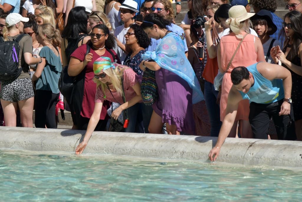 Stiff fines have failed to stop fountain-bathing in the warm weather this year (AFP/Getty)