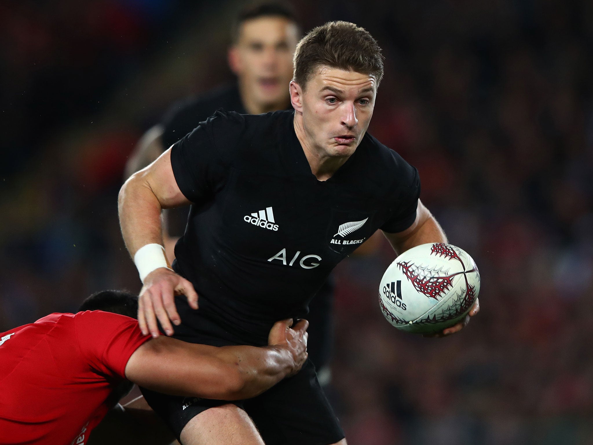 Beauden Barrett looks for the offload