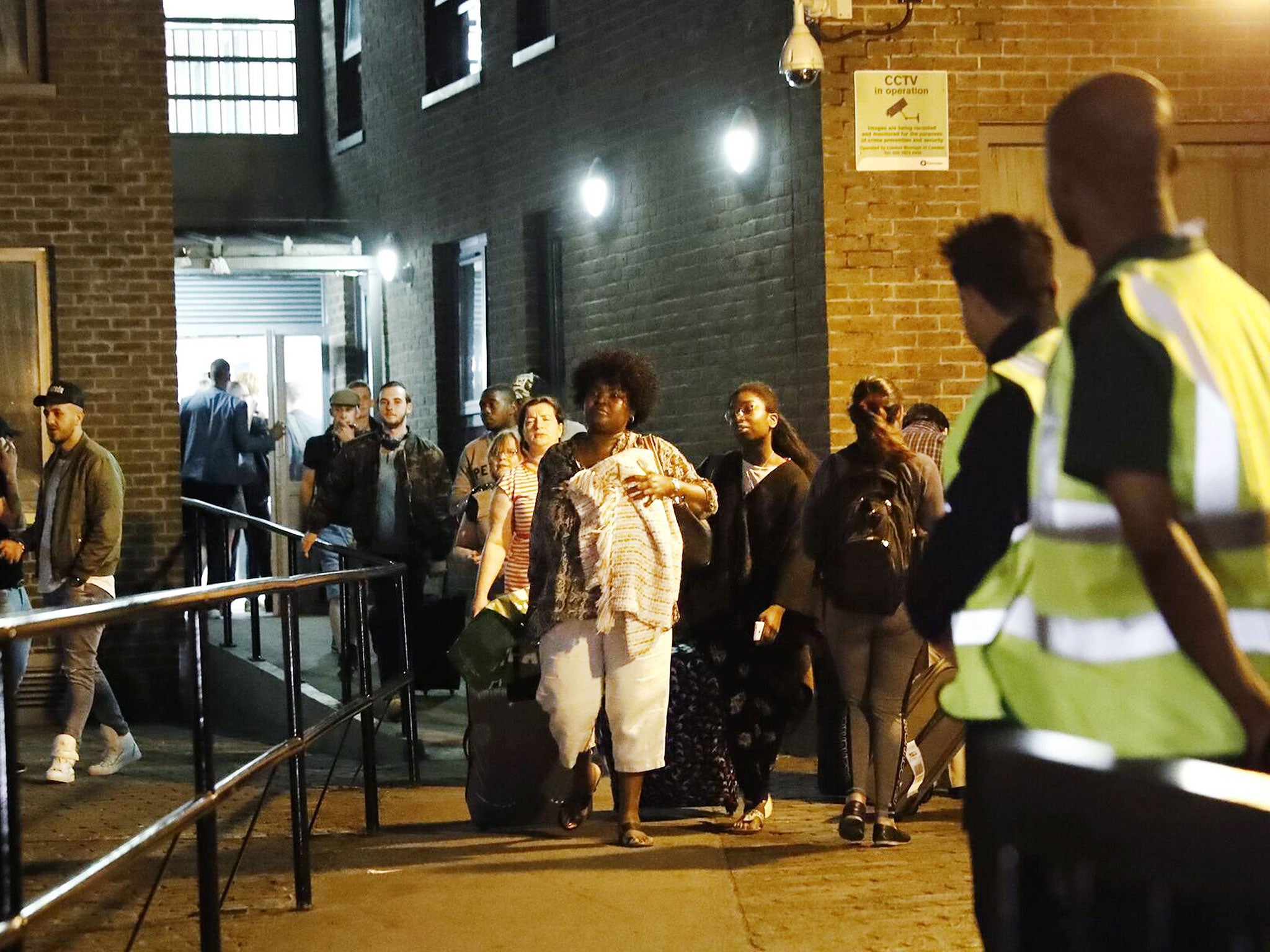 Residents evacuate Chalcots Estate tower blocks in Camden, London, Britain, 23 June 2017