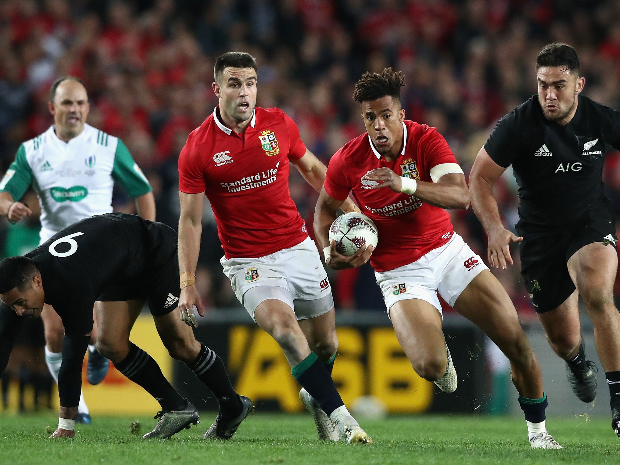 Anthony Watson makes a break for the Lions