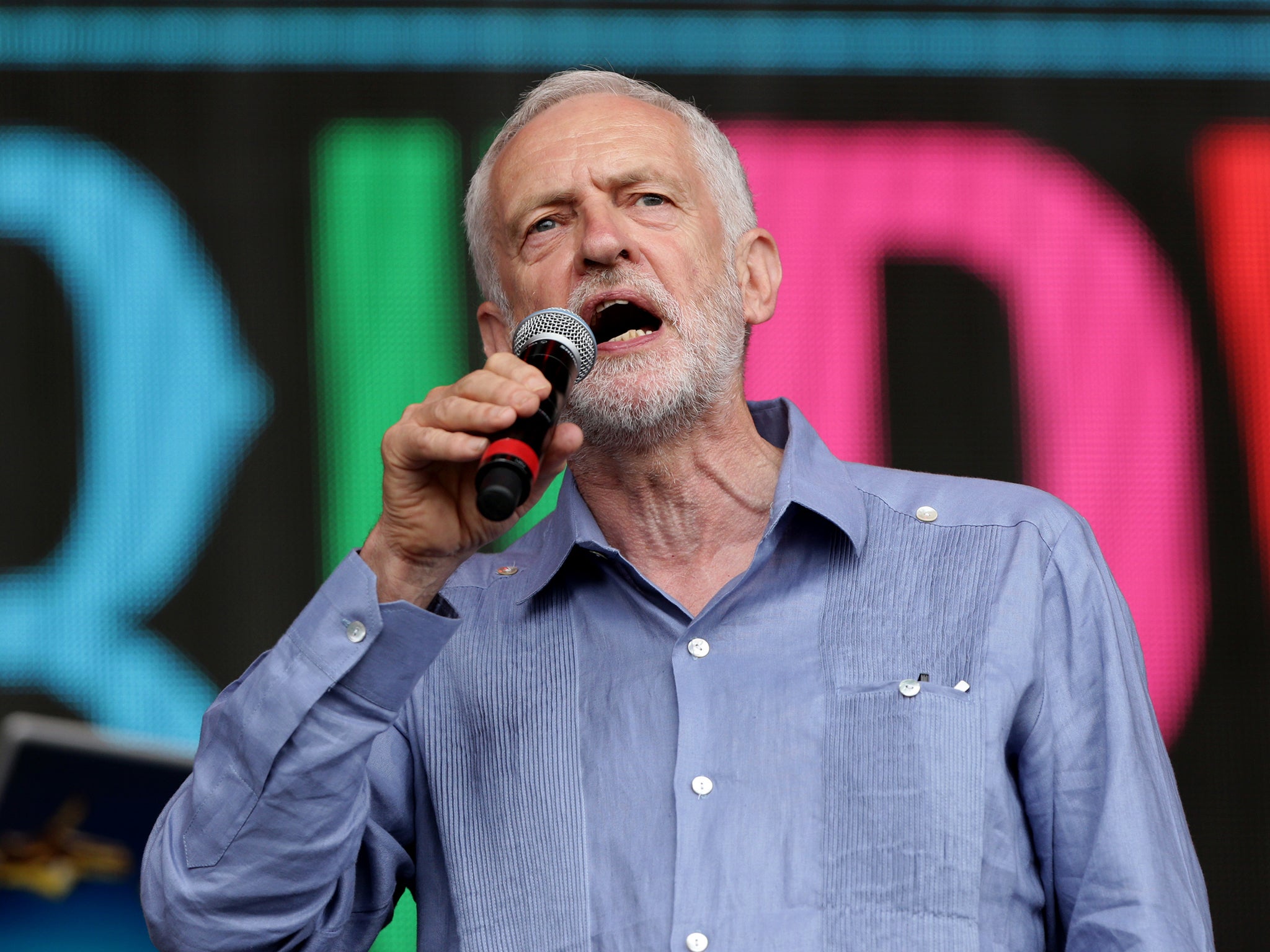 Labour leader Jeremy Corbyn speaks to the crowd from the Pyramid stage at Glastonbury Festival