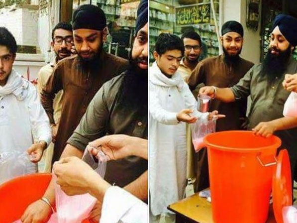 Sikh men helping Muslims during hot month of fasting