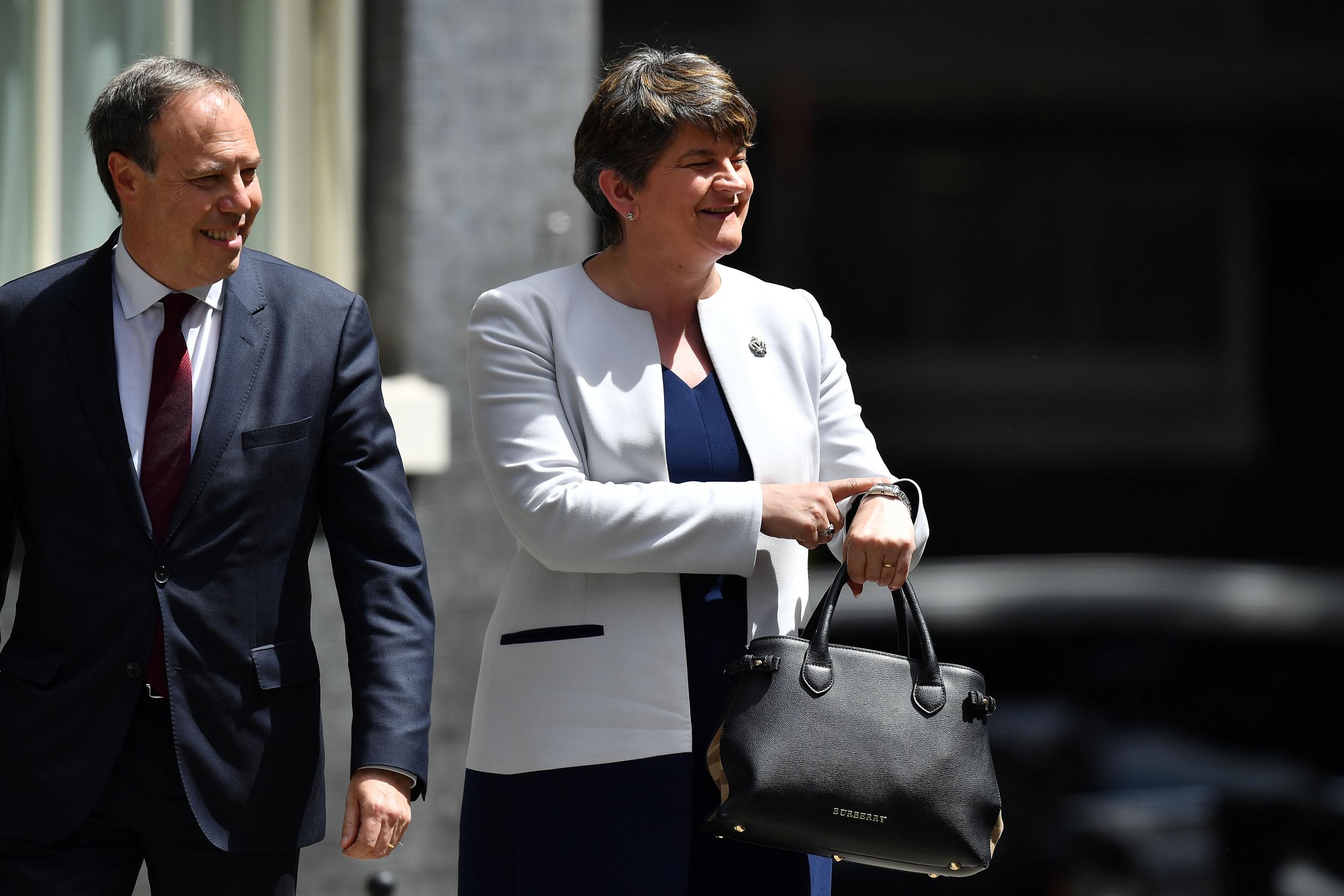 Arlene Foster arrives at Downing Street with the DUP's Westminster leader Nigel Dodds