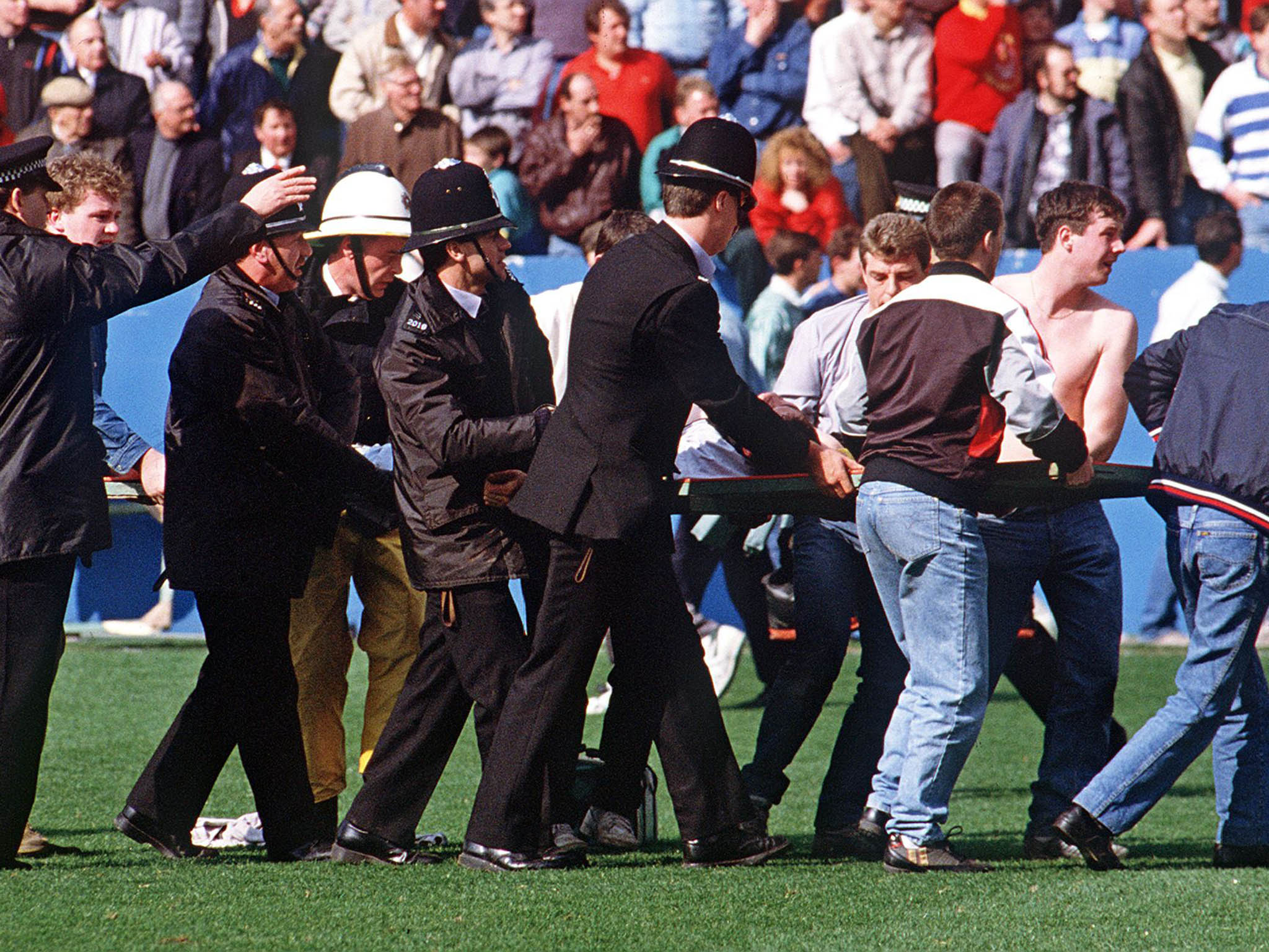 An injured Liverpool fan at Hillsborough stadium