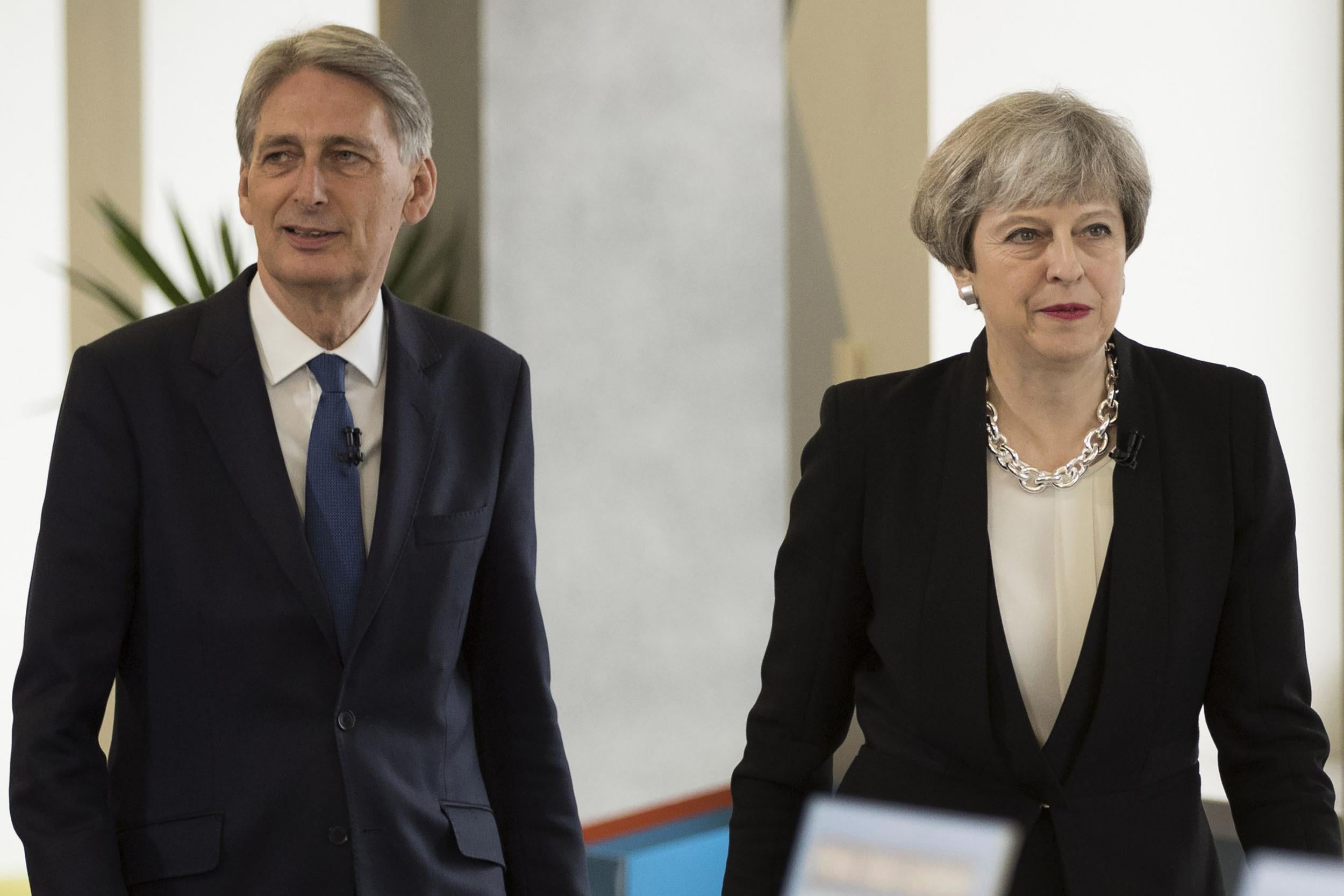 Philip Hammond and Theresa May clashed over public sector pay