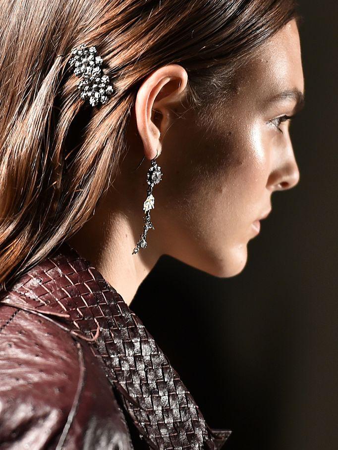 Jewelled barettes were strategically placed directly behind the ear at Bottega Veneta