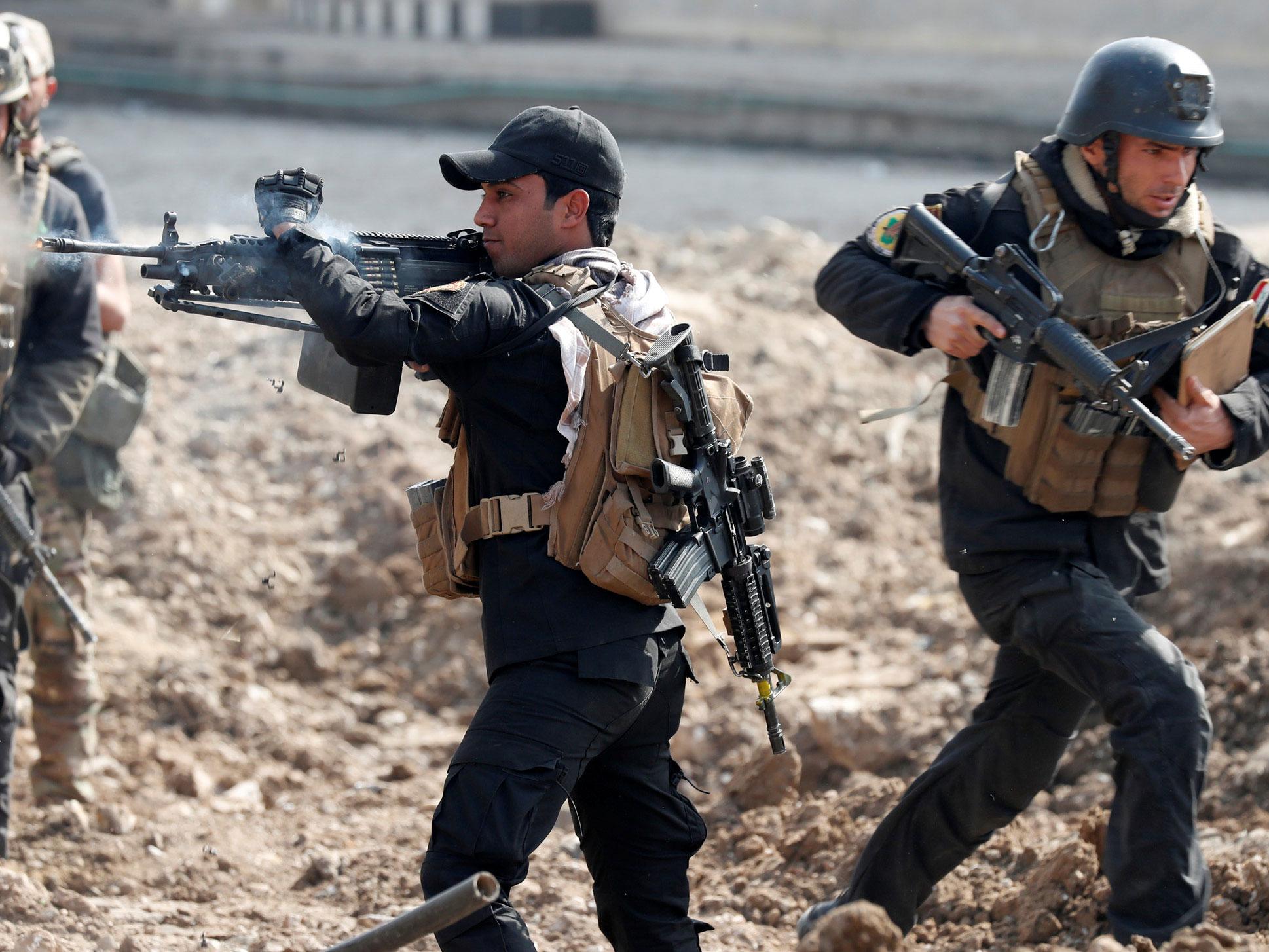 Iraqi special forces soldiers in combat in Mosul, Iraq